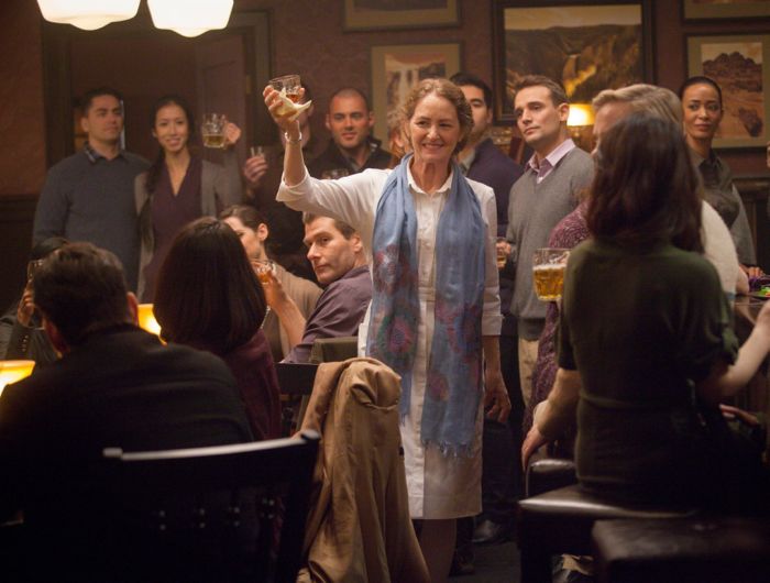 Wayward Pines season 1 episode 4: Pam (Melissa Leo) gives a toast in the "One of Our Senior Realtors Has Chosen to Retire" episode of WAYWARD PINES airing Thursday, June 4 (9:00-10:00 PM ET/PT) on FOX. ©2015 Fox Broadcasting Co. Cr: Liane Hentscher/FOX