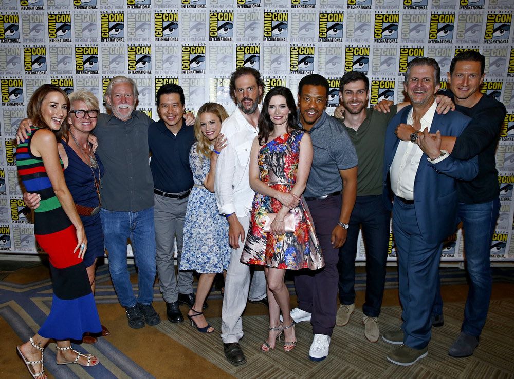 COMIC-CON INTERNATIONAL: SAN DIEGO 2016 -- "Grimm Panel and Press Room" -- Pictured: (l-r) Bree Turner, Lynn Kouf, Producer; Jim Kouf, Executive Producer; Reggie Lee, Claire Coffee, Silas Weir Mitchell, Bitsie Tulloch, Russell Hornsby, David Giuntoli, David Greenwalt, Executive Producer; Sasha Roiz, Friday, July 22, 2016, from the Hilton Bayfront, San Diego, Calif. -- (Photo by: Mark Davis/NBC)