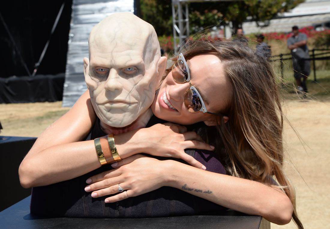 SAN DIEGO, CA - JULY 21: Actress Ruta Gedmintas poses with A wax figure of Quinlan from "The Strain" at FXhibition during Comic-Con International 2016 at Hilton Bayfront on July 21, 2016 in San Diego, California. (Photo by Michael Kovac/Getty Images for FX)