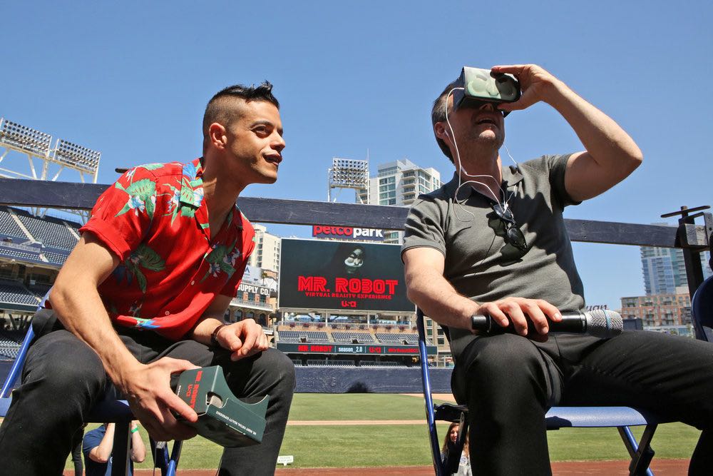 COMIC-CON INTERNATIONAL: SAN DIEGO -- "Mr. Robot Petco Park Stunt" -- Pictured: (l-r) Rami Malek, Christian Slater -- (Photo by: Evans Vestal Ward/USA Network)
