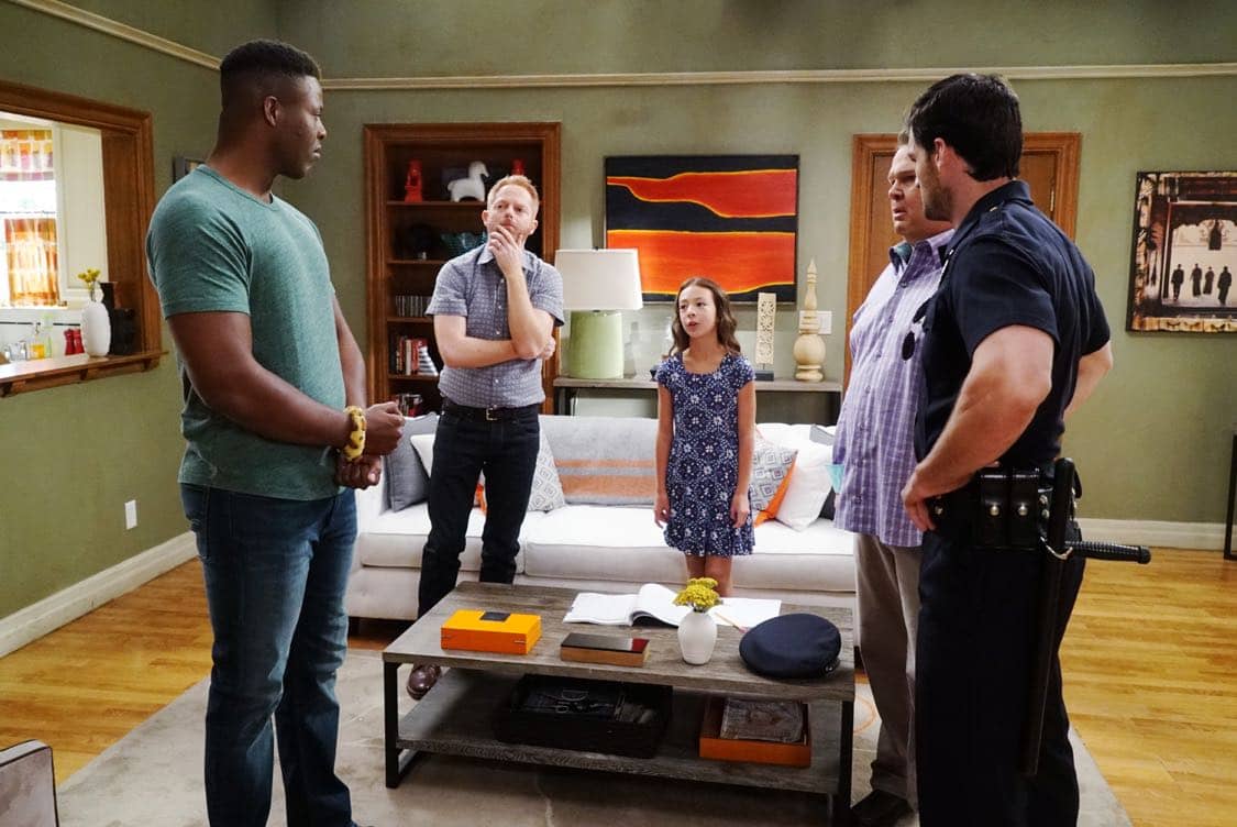 MODERN FAMILY - "Weathering Heights" - Phil can't cover up his excitement when he's invited to appear in a real-estate news segment for the local news. The day gets even better after meeting his "weatherman" hero, Rainer Shine (played by Nathan Fillion). Phil made one little mistake; he introduced him to Hayley. Over at the Pritchett house, Jay decides to infuse a little grit into Manny's video interview for his college application. In the Tucker-Pritchett home, Lily is over their new houseguest and decides to take matters into her own hands, on "Modern Family," WEDNESDAY, OCTOBER 12 (9:00-9:30 p.m. EDT), on the ABC Television Network. (ABC/Ron Tom) WINSTON DUKE, JESSE TYLER FERGUSON, AUBREY ANDERSON-EMMONS, ERIC STONESTREET, CALEB SMITH