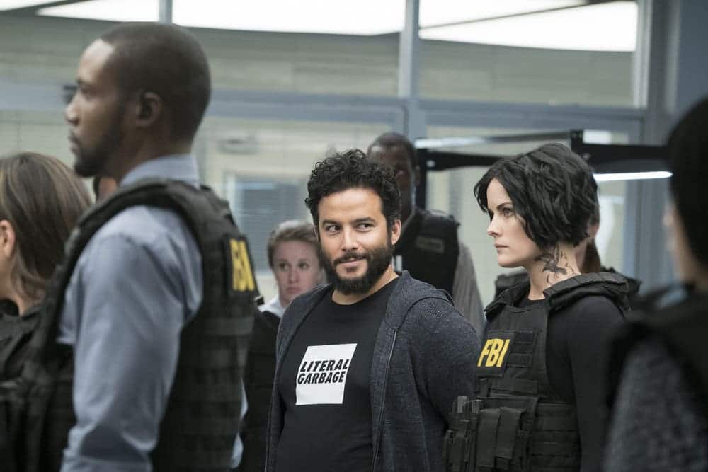 BLINDSPOT -- "Resolves Eleven Myths" Episode 207 -- Pictured: (l-r) Rob Brown as Edgar Reade, Ennis Esmer as RichDot Com, Jaimie Alexander as Jane Doe -- (Photo by: Virginia Sherwood/NBC)
