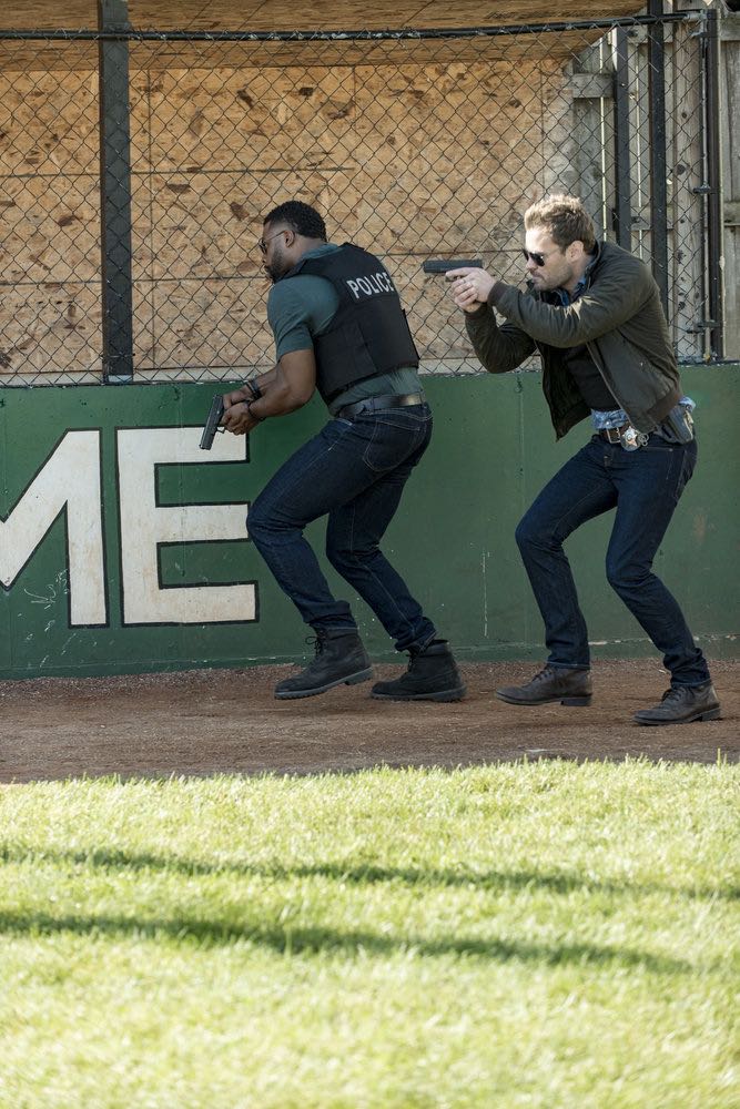 CHICAGO P.D. -- "Skin in the Game" Episode 406 -- Pictured: (l-r) LaRoyce Hawkins as Kevin Atwater, Patrick Flueger as Kyle Ruzek -- (Photo by: Matt Dinerstein/NBC)