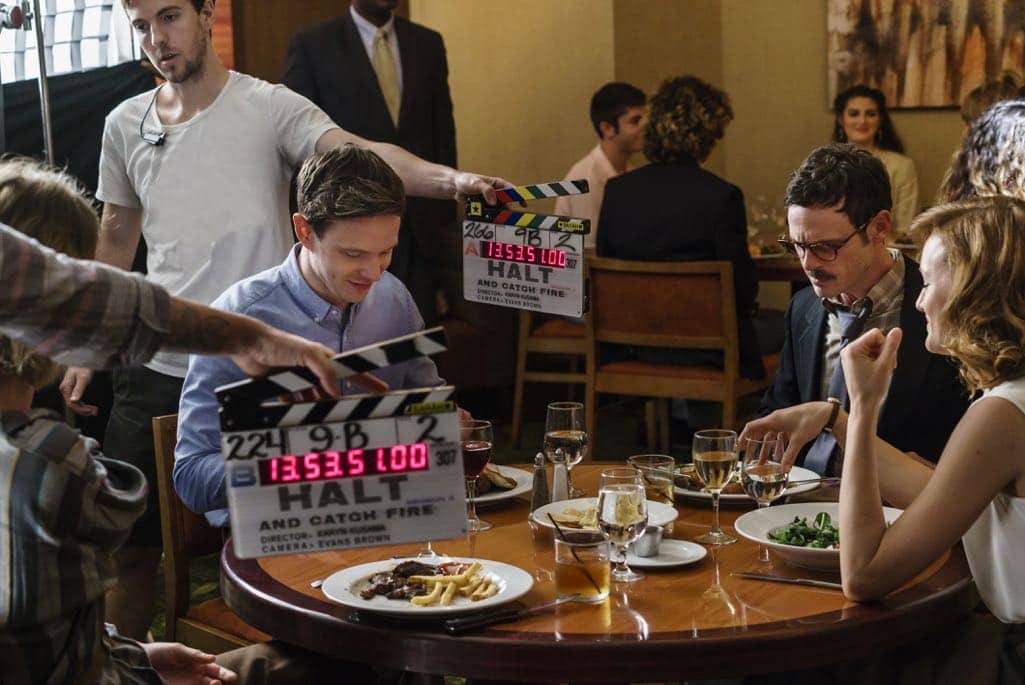 BTS, Scoot McNairy as Gordon Clark, Mackenzie Davis as Cameron Howe, Mark O'Brien as Tom Rendon - Halt and Catch Fire _ Season 3, Episode 7  - Photo Credit: Tina Rowden/AMC