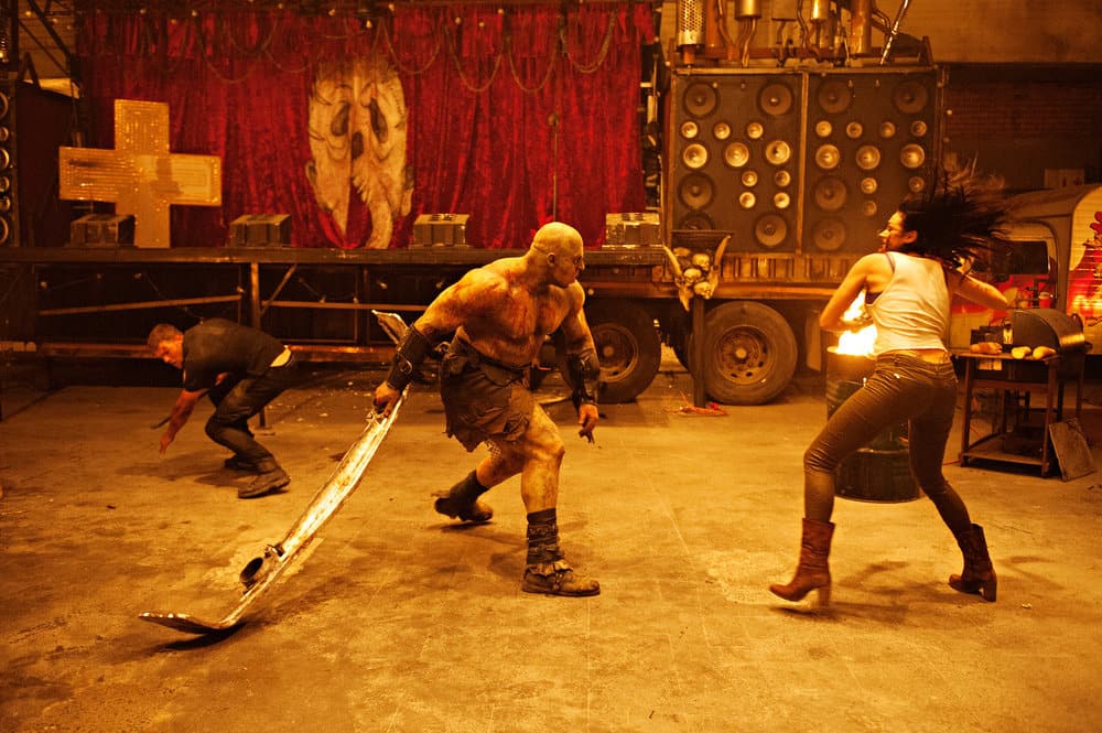 BLOOD DRIVE -- "Gentleman's Agreement" Episode 107 -- Pictured: (l-r) Martyn Ford as Denali, Christina Ochoa as Grace BLOOD DRIVE -- "Gentleman's Agreement" Episode 107 -- Pictured: (l-r) Martyn Ford as Denali, Christina Ochoa as Grace