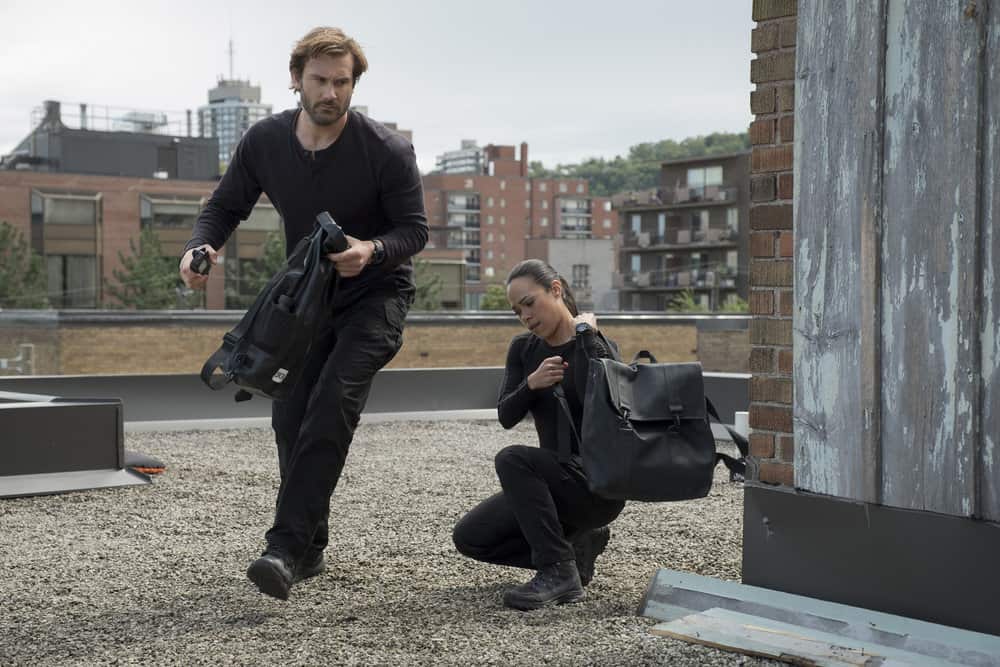 TAKEN -- "Invitation Only" Episode 207 -- Pictured: (l-r) Clive Standen as Bryan Mills, Jessica Camacho as Santana -- (Photo by: Panagiotis Pantazidis/NBC)