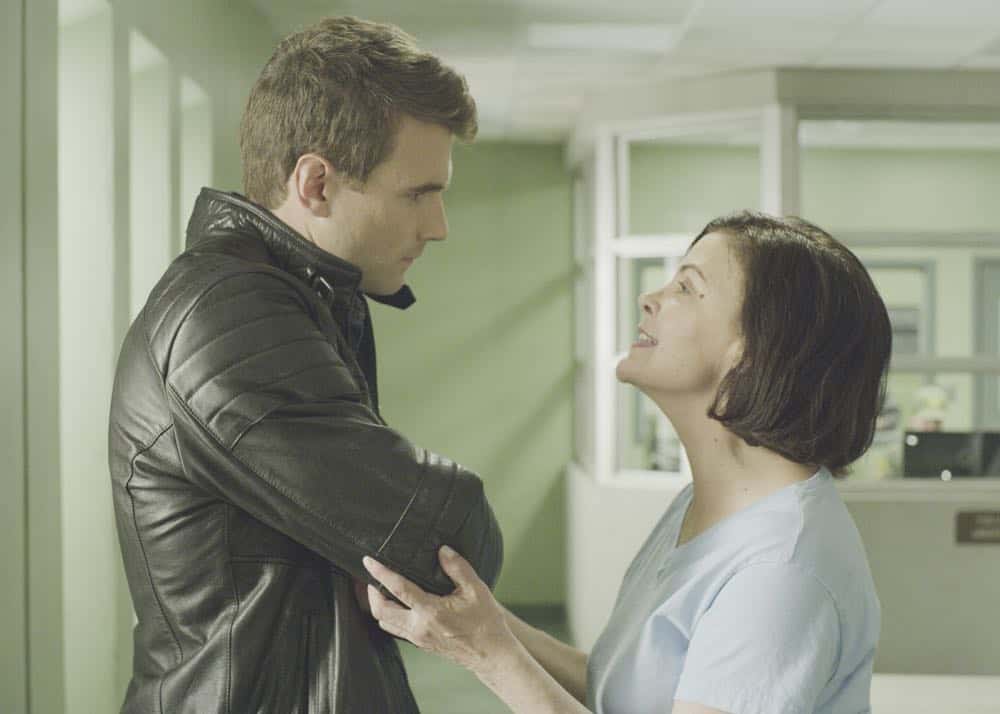 "Source" -- Jim Street debates whether or not his mother, Karen (Sherilyn Fenn), should live with him upon her prison release after Hondo and Chris warn him against it. Also, Hondo and the team are assigned to protect Irina Zemanova (Anya Monzikova), a high profile Russian journalist visiting Los Angeles, from being assassinated, on S.W.A.T., Thursday, April 26 (10:00-11:00, ET/PT) on the CBS Television Network. Pictured Left to right: Alex Russell as Jim Street and Sherilyn Fenn as Karen. Photo: Best Possible Screen Grab/CBS. ÃÂ©2018 CBS Broadcasting, Inc. All Rights Reserved