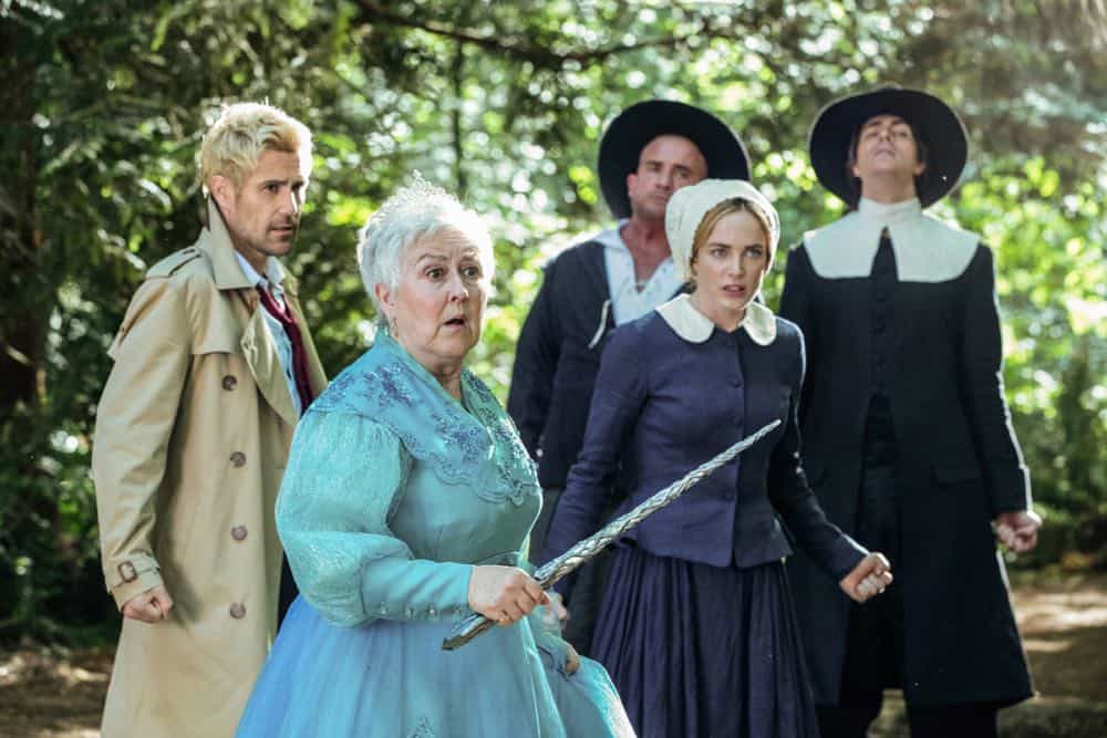 DC's Legends of Tomorrow -- "Witch Hunt" -- Image Number: LGN402b_0680b.jpg -- Pictured (L-R): Matt Ryan as Constantine, Jane Carr as Godmother, Dominic Purcell as Mick Rory/Heat Wave, Caity Lotz as Sara Lance/White Canary and Brandon Routh as Ray Palmer/Atom -- Photo: Jack Rowand/The CW -- é 2018 The CW Network, LLC. All Rights Reserved.