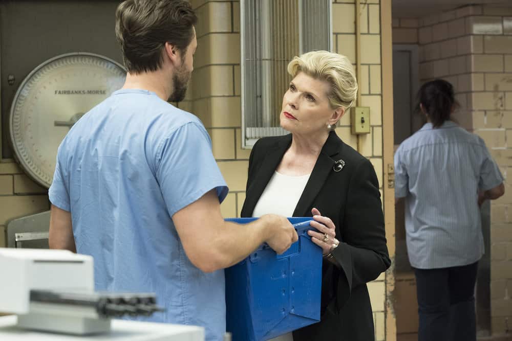 NEW AMSTERDAM -- "Your Turn" Episode 201 -- Pictured: (l-r) Ryan Eggold as Dr. Max Goodwin, Debra Monk as Karen Brantley -- (Photo by: Virginia Sherwood/NBC) NEW AMSTERDAM -- "Your Turn" Episode 201 -- Pictured: (l-r) Ryan Eggold as Dr. Max Goodwin, Debra Monk as Karen Brantley -- (Photo by: Virginia Sherwood/NBC)