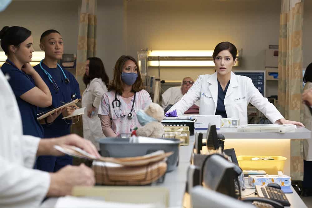 NEW AMSTERDAM Season 4 Episode 12 Photos The Crossover 7 NEW AMSTERDAM Season 4 Episode 12 -- "The Crossover" Episode 412 -- Pictured: (l-r) Amaia Arana as ED Resident Roxana Zamaya, Chloe Freeman as ED Resident Pavan Carey, Janet Montgomery as Dr. Lauren Bloom -- (Photo by: Michael Greenberg/NBC)