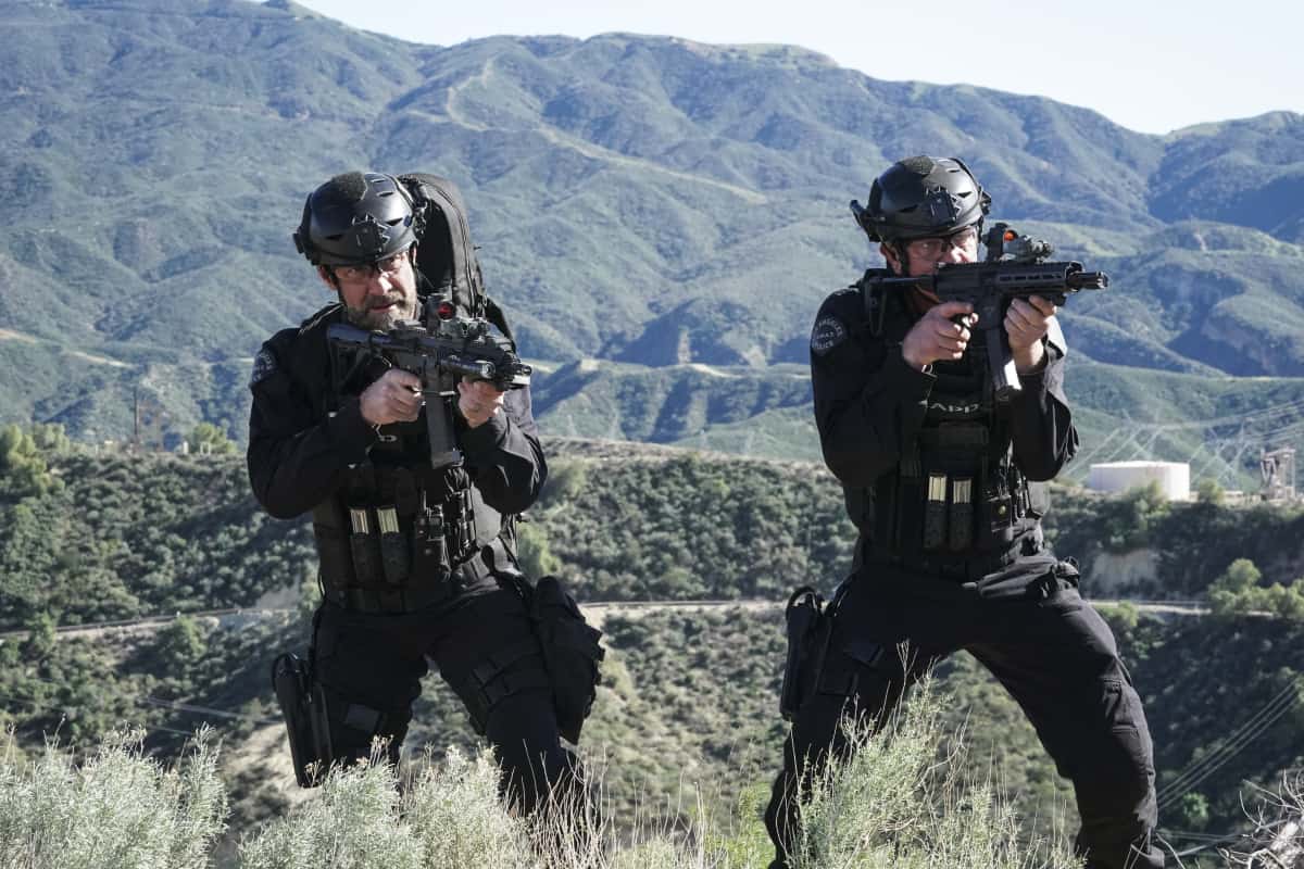 SWAT Season 5 Episode 17 “Cry Foul” – When a series of deadly explosions hits oil derricks across Los Angeles, SWAT teams up to hunt down an activist turned terrorist. Also, Deacon and his wife, Annie (Bre Blair), work to free a reformed drug dealer they believe was sent away for a murder he didn’t commit, on the CBS Original series S.W.A.T., Sunday, April 17 (10:00-11:00 PM, ET/PT) on the CBS Television Network, and available to stream live and on demand on Paramount+*.  Pictured (L-R): Jay Harrington as David “Deacon” Kay and Kenneth “Kenny” Johnson as Dominique Luca. Photo: Bill Inoshita/CBS ©2022 CBS Broadcasting, Inc. All Rights Reserved.
