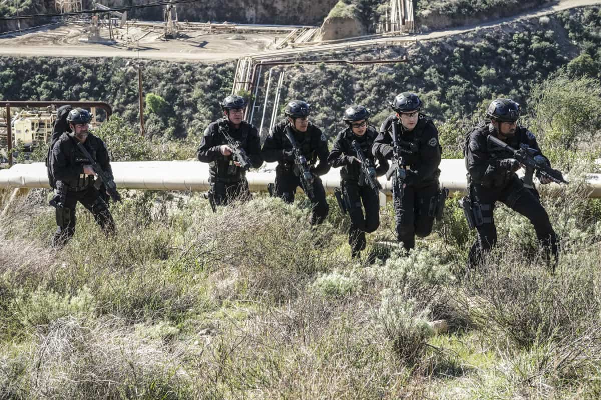 SWAT Season 5 Episode 17 “Cry Foul” – When a series of deadly explosions hits oil derricks across Los Angeles, SWAT teams up to hunt down an activist turned terrorist. Also, Deacon and his wife, Annie (Bre Blair), work to free a reformed drug dealer they believe was sent away for a murder he didn’t commit, on the CBS Original series S.W.A.T., Sunday, April 17 (10:00-11:00 PM, ET/PT) on the CBS Television Network, and available to stream live and on demand on Paramount+*.  Pictured (L-R): Jay Harrington as David “Deacon” Kay, Kenneth “Kenny” Johnson as Dominique Luca, David Lim as Victor Tan, Lina Esco as Christina “Chris” Alonso, Alex Russell as Jim Street and Shemar Moore as Daniel “Hondo” Harrelson. Photo: Bill Inoshita/CBS ©2022 CBS Broadcasting, Inc. All Rights Reserved.
