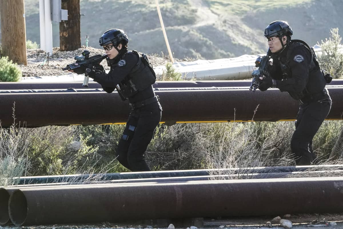 SWAT Season 5 Episode 17 “Cry Foul” – When a series of deadly explosions hits oil derricks across Los Angeles, SWAT teams up to hunt down an activist turned terrorist. Also, Deacon and his wife, Annie (Bre Blair), work to free a reformed drug dealer they believe was sent away for a murder he didn’t commit, on the CBS Original series S.W.A.T., Sunday, April 17 (10:00-11:00 PM, ET/PT) on the CBS Television Network, and available to stream live and on demand on Paramount+*.  Pictured (L-R): Lina Esco as Christina “Chris” Alonso and David Lim as Victor Tan. Photo: Bill Inoshita/CBS ©2022 CBS Broadcasting, Inc. All Rights Reserved.