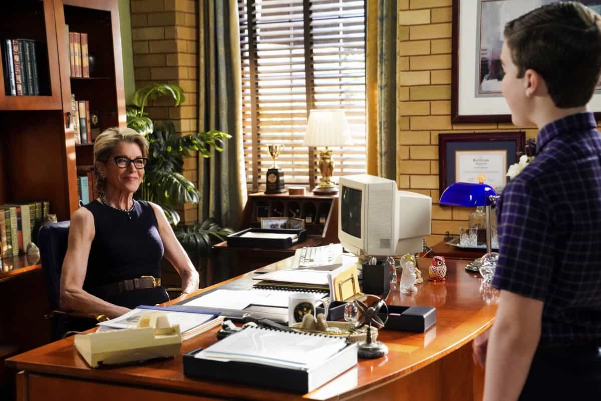 YOUNG SHELDON Season 5 Episode 21 “White Trash, Holy Rollers and Punching People” – As the church congregation gossips about Georgie, Missy stands up for her brother, and Sheldon is distracted by the family drama, on YOUNG SHELDON, Thursday, May 12 (8:00-8:31 PM, ET/PT) on the CBS Television Network, and available to stream live and on demand on Paramount+. Pictured (L-R): Wendie Malick as President Hagemeyer and Iain Armitage as Sheldon.  Photo Credit: Robert Voets/ 2022 Warner Bros. Entertainment Inc.  All Rights Reserved.