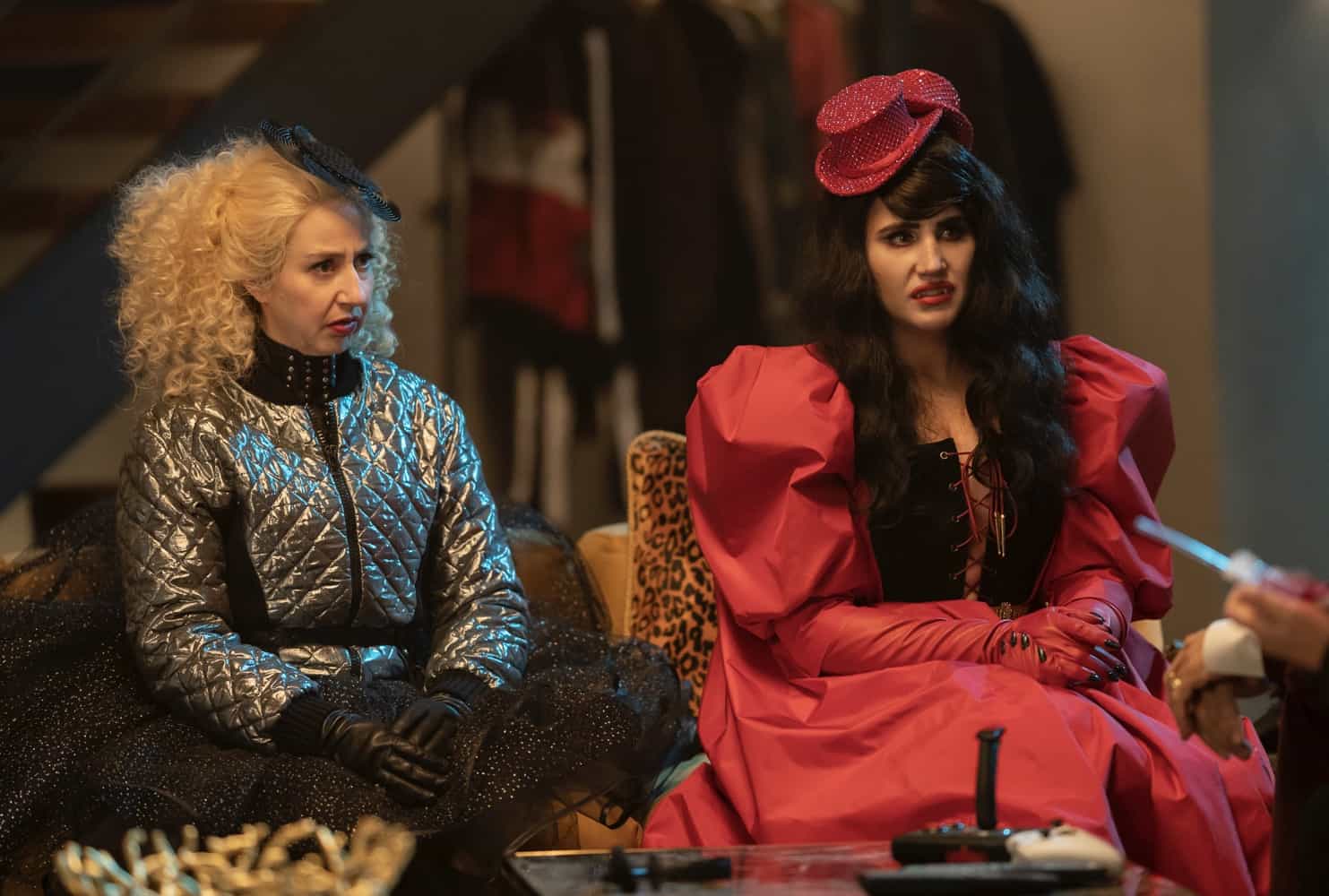 WHAT WE DO IN THE SHADOWS Season 4 Episode 3 -- “The Grand Opening” --  Season 4, Episode 3 (Airs July 19) — Pictured: Natasia Demetriou as Nadja, Kristen Schaal as The Guide.  CR: Russ Martin: FX