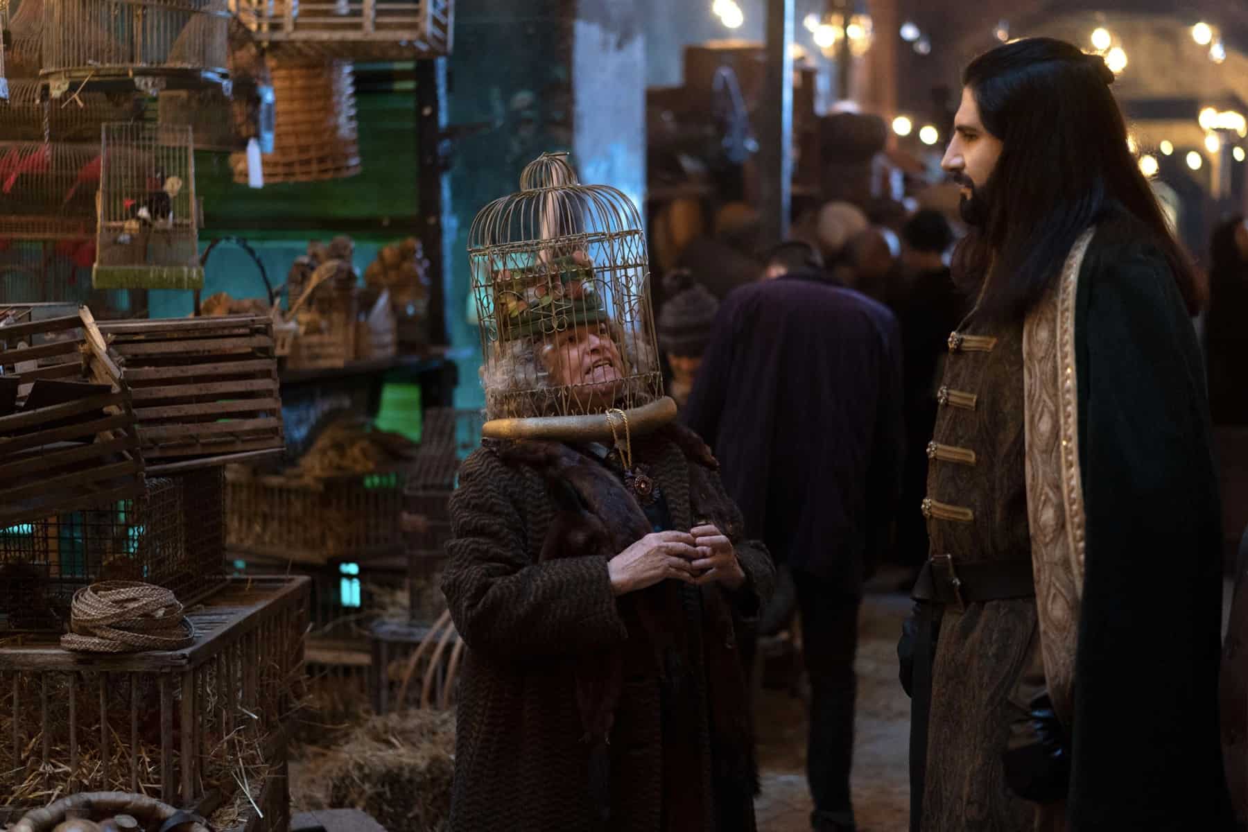 WHAT WE DO IN THE SHADOWS Season 4 Episode 4 Photos The Night Market 2 WHAT WE DO IN THE SHADOWS Season 4 Episode 4 -- ‘The Night Market” -- Season 4, Episode 4 (Airs July 26) — Pictured: Kayvan Novak as Nandor. CR: Russ Martin/FX
