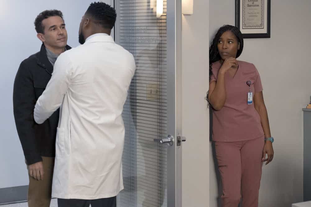 NEW AMSTERDAM Season 5 Episode 11 -- "Falling" Episode 511 -- Pictured: (l-r) Rey Lucas as Manny Binelas Sr, Toya Turner as Gabrielle -- (Photo by: Francisco Roman/NBC)