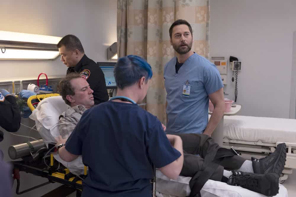 NEW AMSTERDAM Season 5 Episode 11 image-- "Falling" Episode 511 -- Pictured: Rob McClure as Dave August, Ryan Eggold as Dr. Max Goodwin -- (Photo by: Francisco Roman/NBC)