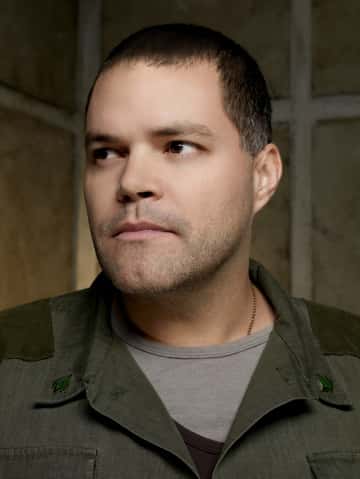 BATTLESTAR GALACTICA -- Pictured: Aaron Douglas as Tyrol -- SCI FI Channel Photo: Justin Stephens