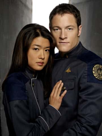 BATTLESTAR GALACTICA -- Pictured: (l-r) Grace Park as Sharon Valerii, Tahmoh Penikett as Karl "Helo" Agathon -- SCI FI Channel Photo: Justin Stephens