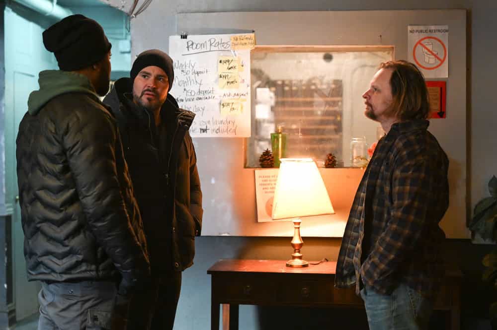 CHICAGO PD Season 10 Episode 19 -- "The Bleed Valve" Episode 1019 -- Pictured: (l-r) LaRoyce Hawkins as Kevin Atwater, Patrick John Flueger as Adam Ruzek, Jason Scott Morgan as Owner -- (Photo by: Lori Allen/NBC)