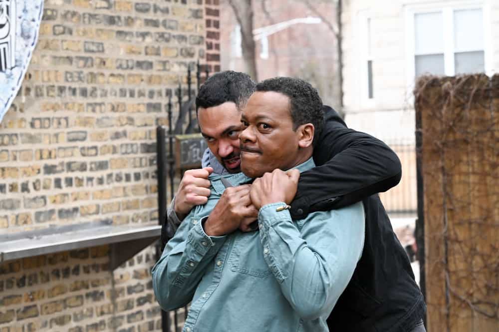 CHICAGO P.D. -- "The Bleed Valve" Episode 1019 -- Pictured: (l-r) Adam Lindo as Carlos, Erik LaRay Harvey as Lew Atwater -- (Photo by: Lori Allen/NBC)