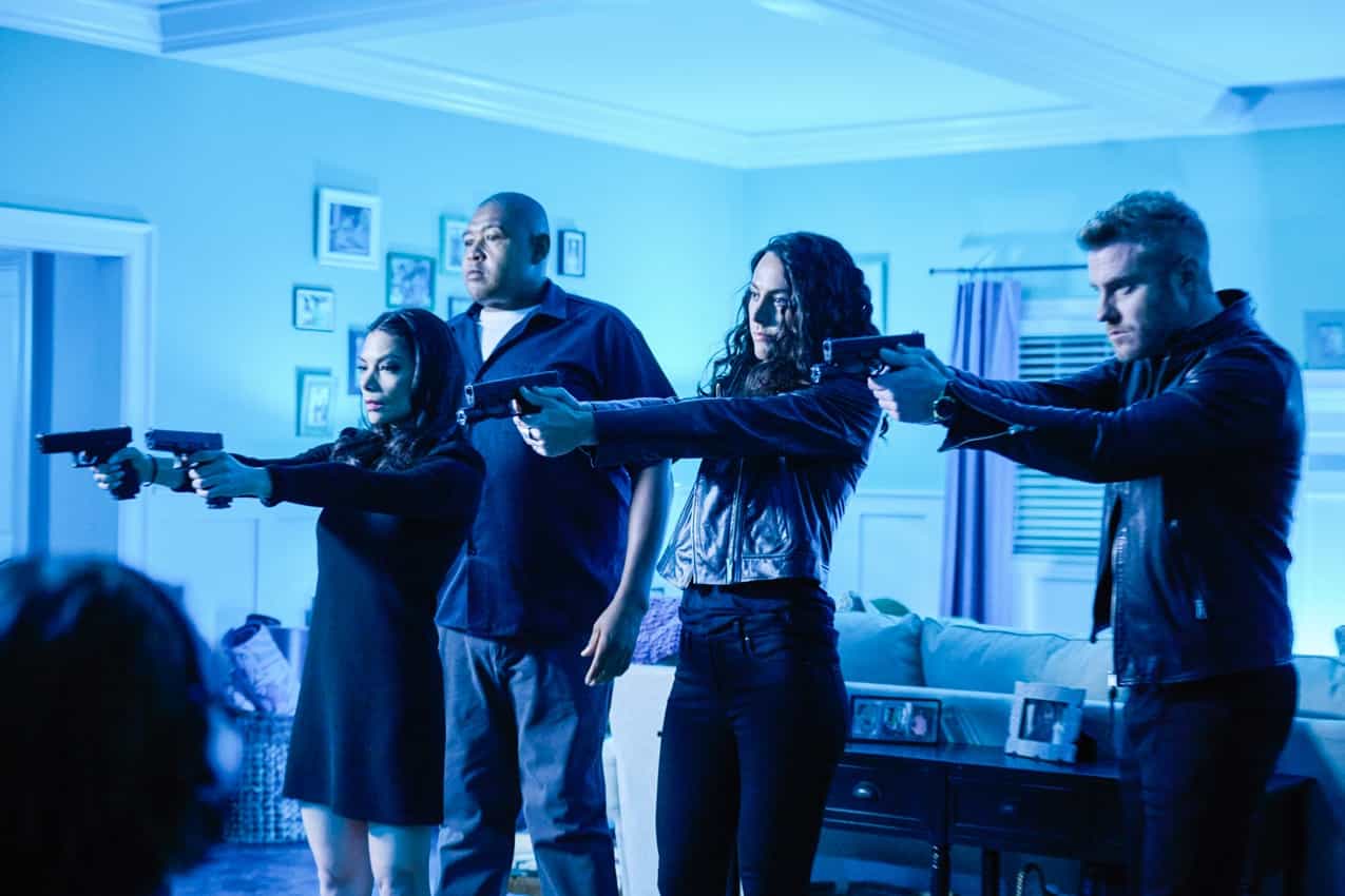 TRUE LIES Season 1 Episode 13 promo “Waking Dreams” – With an Omega Sector spy missing, the entire agency searches for clues. Harry and Helen’s relationship with each other, their team and reality itself, is tested in unimaginable ways, even for the best of spies and spouses, on the conclusion of the two-part first season finale of the CBS Original series TRUE LIES, Wednesday, May 17 (10:00-11:00 PM, ET/PT) on the CBS Television Network, and available on the CBS app and streaming on Paramount+*. Pictured L to R: Ginger Gonzaga as Helen Tasker, Omar Miller as Gib, Erica Hernandez as Maria, and Mike O\'Gorman as Luther. Photo: Tom Griscom/CBS ©2023 CBS Broadcasting, Inc. All Rights Reserved.