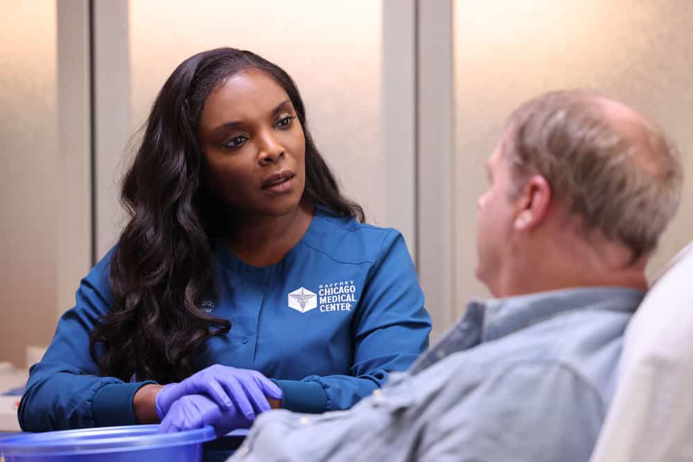 CHICAGO MED Season 9 Episode 4 -- "These Are Not the Droids You are Looking For" Episode 9004 -- Pictured: (l-r) Marlyne Barrett as Maggie Lockwood, Kiff Vandenheuvel as Floyd Bevans -- (Photo by: George Burns Jr/NBC)