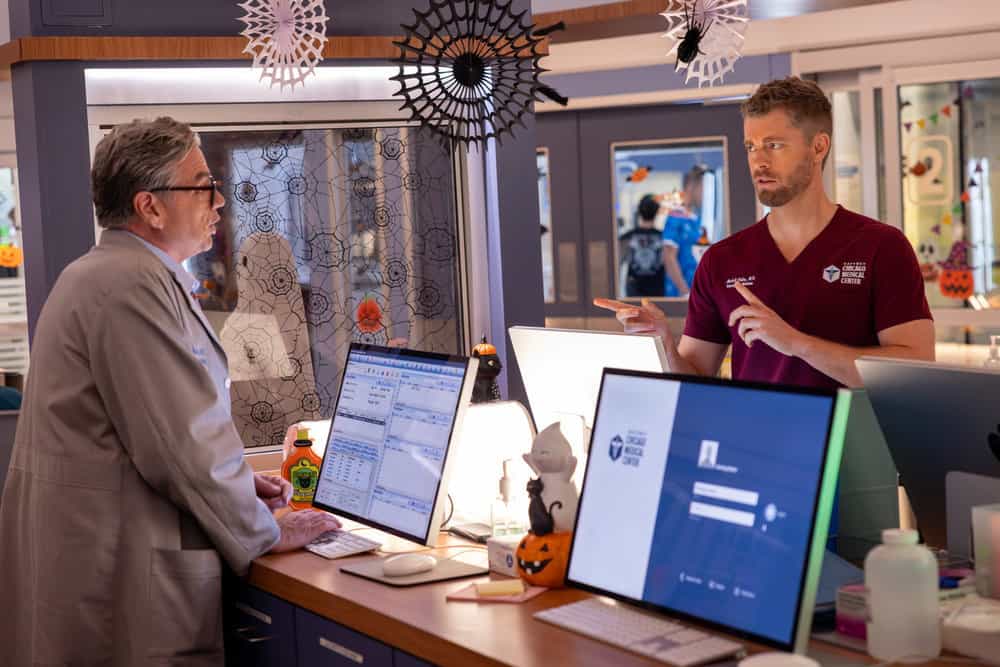 CHICAGO MED -- "What's Hiding in the Dark" Episode 1105 -- Pictured: (l-r) Oliver Platt as Dr. Daniel Charles, Luke Mitchell as Dr. Mitch Ripley -- (Photo by: George Burns Jr/NBC)