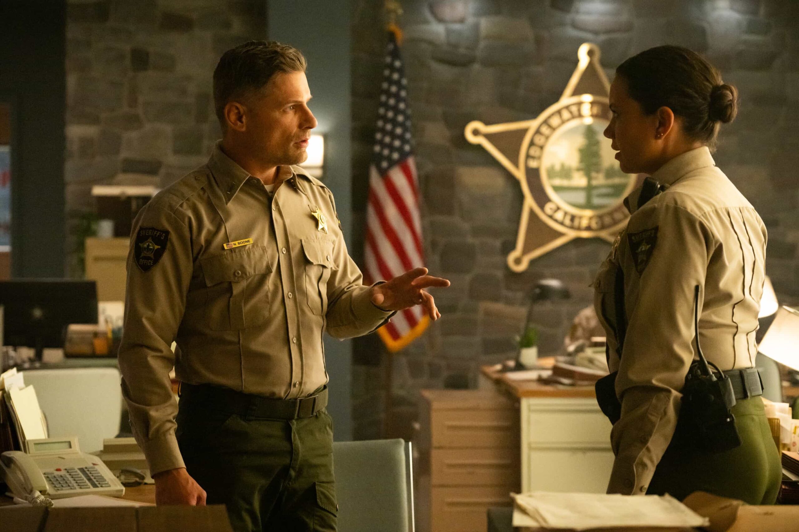 “The Sixth Man” – When a daring daylight robbery shakes the heart of Edgewater, Sheriff Mickey Fox must navigate rising tensions, personal entanglements and a town quick to judge. Meanwhile, suspicions swirl around her daughter, Skye, and her involvement in a high-profile murder case, on SHERIFF COUNTRY, Friday, Oct. 31 (8:00-9:00 PM, ET/PT) on the CBS Television Network, and streaming on Paramount+ (live and on-demand for Paramount+ Premium plan subscribers, or on-demand for Paramount+ Essential subscribers the day after the episode airs)*. Pictured: Matt Lauria as Nathan Boone and Michele Weaver as Cassidy Campbell. Photo: Christos Kalohoridis/CBS ©2025 CBS Broadcasting, Inc. All Rights Reserved.