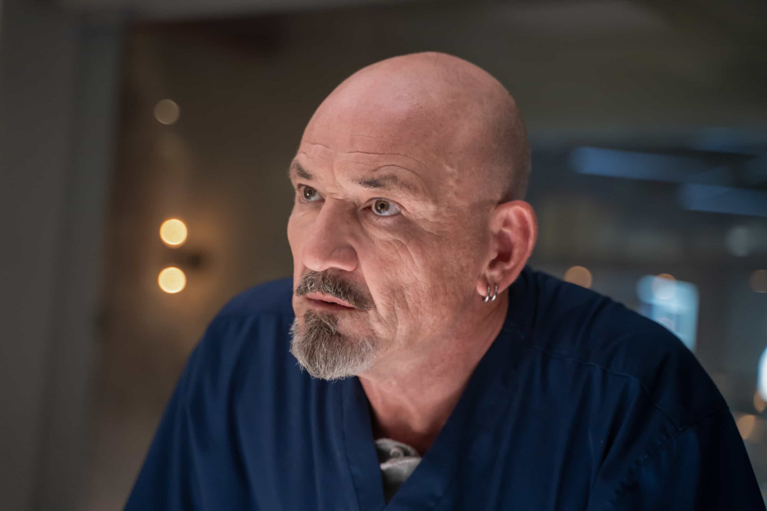 “Happy When It Rains” – Watson and the team jump into action when four new patients are brought to UHOP with wounds that appear to be infected with a flesh-eating bacterium following a tornado. Meanwhile, Shinwell searches for meaning as a nursing student and Adam’s wedding to Lauren risks being halted, on the CBS Original series WATSON, Monday, Nov. 3 (10:00-11:00 PM, ET/PT) on the CBS Television Network, and streaming on Paramount+* (live and on-demand for Paramount+ Premium plan subscribers, or on-demand for Paramount+ Essential subscribers the day after the episode airs).  Pictured: Ritchie Coster as Shinwell Johnson   Photo: Colin Bentley/CBS ©2025 CBS Broadcasting, Inc. All Rights Reserved.