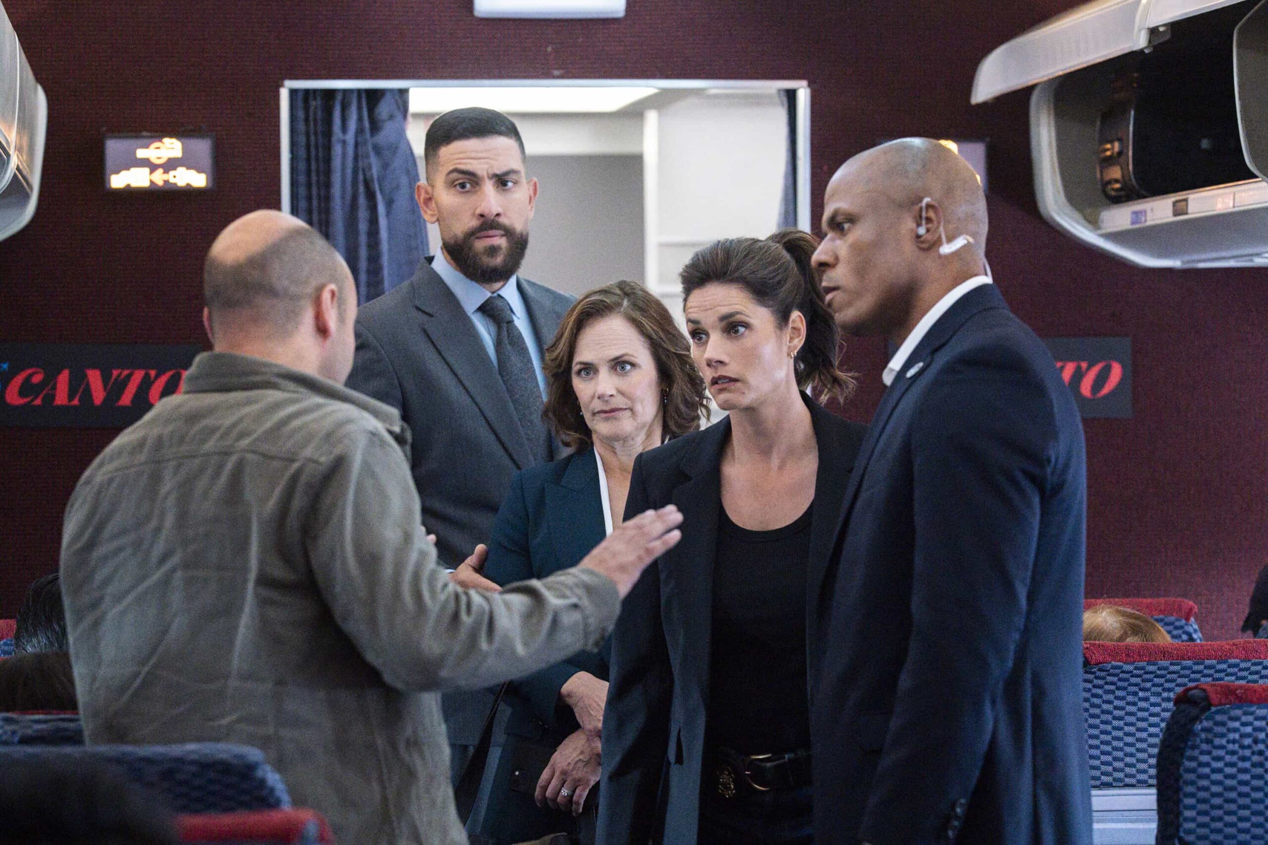 “Manifest” – Following a failed assassination attempt on a U.S. senator, OA and Maggie are tasked with escorting her back to Washington, D.C. on a flight that becomes more perilous than imagined, on FBI, Monday, Nov. 3 (9:00-10:00 PM, ET/PT) on the CBS Television Network, and streaming on Paramount+ (live and on-demand for Paramount+ Premium plan subscribers, or on-demand for Paramount+ Essential subscribers the day after the episode airs).  Pictured (L-R): Zeeko Zaki as Special Agent Omar Adom ‘OA’ Zidan, Sarah Clarke as Senator Charlotte Hirsch, Missy Peregrym as Special Agent Maggie Bell and Deji LaRay as USCP Officer Kane. Photo: Bennett Raglin/CBS ©2025 CBS Broadcasting, Inc. All Rights Reserved.