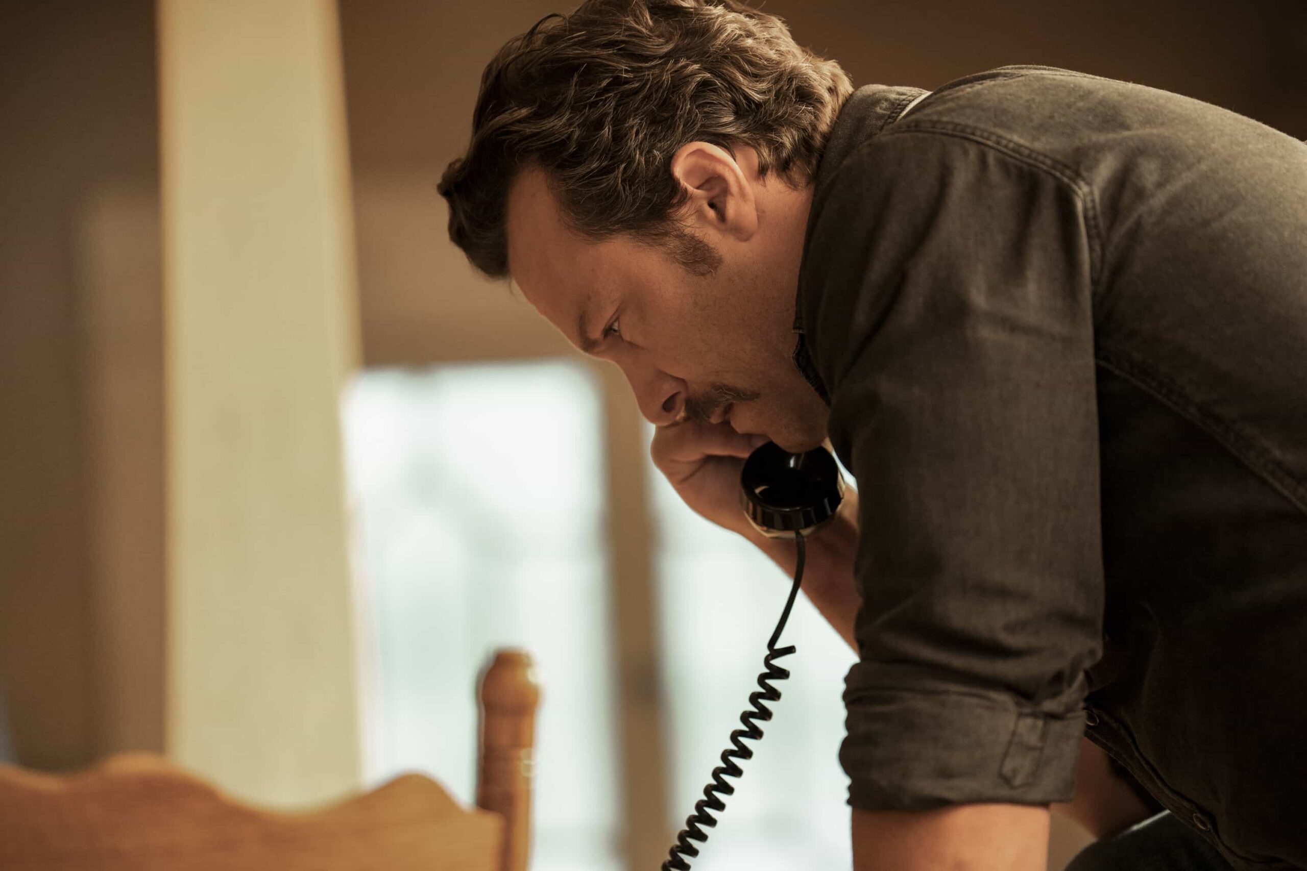 “No Man Left Behind” – Tensions rise when Franks’ estranged older brother, Mason (guest star Philip Winchester), blows into town, desperate for help after hitting rock bottom. Also, the team investigates the robbery of a Navy bank while Lala, still struggling after her accident, makes a decision about her future, on NCIS: ORIGINS, Tuesday, Nov. 4 (9:00-10:00 PM, ET/PT) on the CBS Television Network, and streaming on Paramount+ (live and on demand for Paramount+ Premium plan subscribers, or on demand for Paramount+ Essential subscribers the day after the episode airs)*.  Pictured (L-R): Kyle Schmid as Mike Franks.  Photo: Erik Voake/CBS ©2025 CBS Broadcasting, Inc. All Rights Reserved.