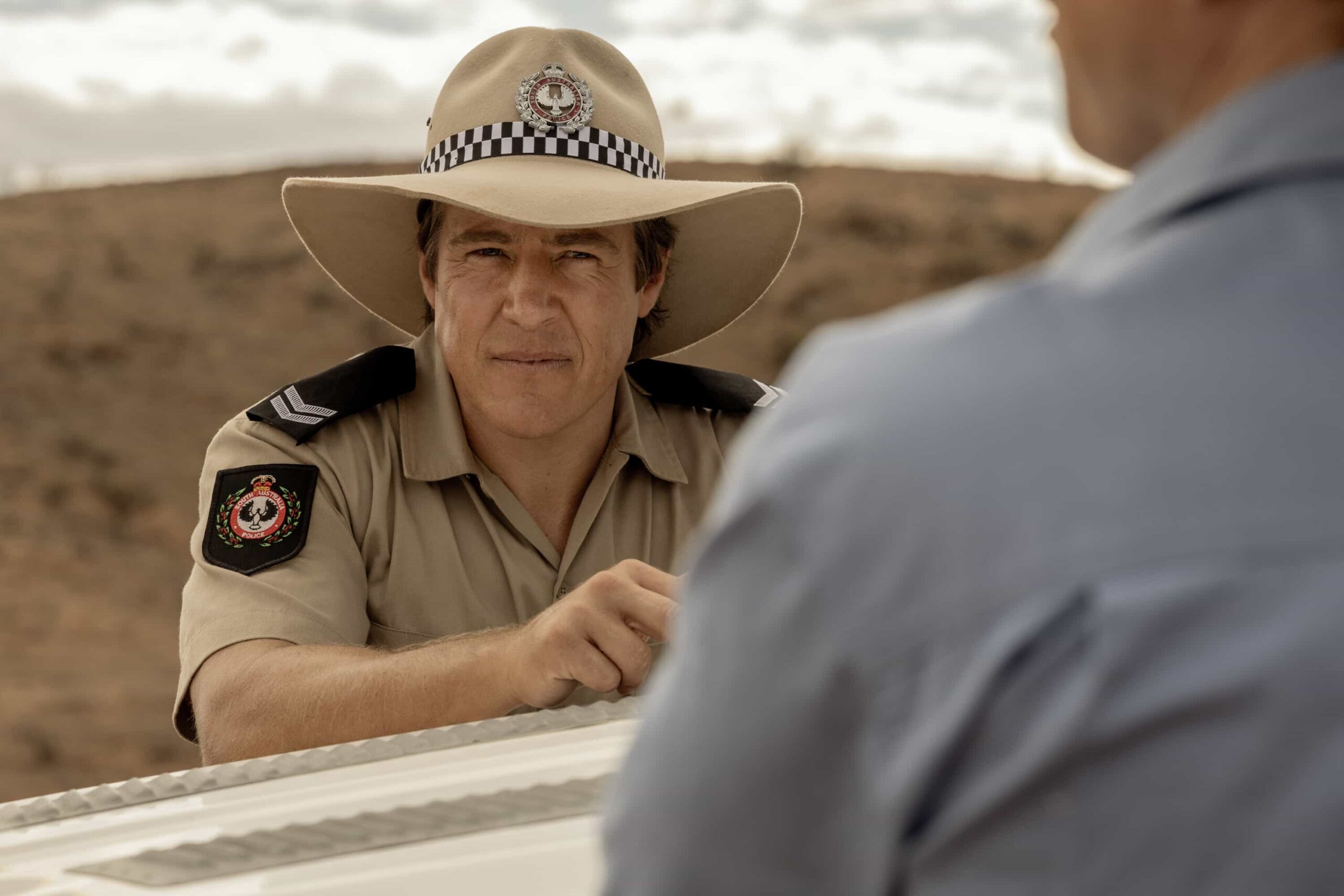 NCIS: Sydney Season 3 Episode 4 “The Truth Is Outback” – When a U.S. Navy pilot goes missing at a UFO hotspot in the Outback after being chased by blinding lights, the team must discover if the truth is really “out there,” on NCIS: SYDNEY, Tuesday, Nov. 4 (10:00-11:00 PM, ET/PT) on the CBS Television Network, and streaming on Paramount+ (live and on demand for Paramount+ Premium plan subscribers, or on demand for Paramount+ Essential subscribers the day after the episode airs)*. Stephen Peacocke as Karl Drysdale in NCIS: Sydney episode 4, season 3 streaming on Paramount+, 2025. Photo Credit: Daniel Asher Smith/Paramount+ © TM & © 2025 CBS Studios Inc. NCIS: Sydney and related marks and logos are trademarks of CBS Studios Inc. All Rights Reserved.