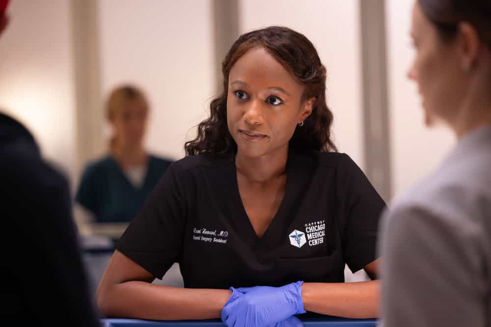 Chicago Med Season 11 Episode 6 “The Story of Us” – Family Drama and Medical Crises Unfold 9 CHICAGO MED -- "The Story of Us" Episode 1106 -- Pictured: Ashlei Sharpe Chestnut as Dr. Naomi Howard -- (Photo by: George Burns Jr/NBC)