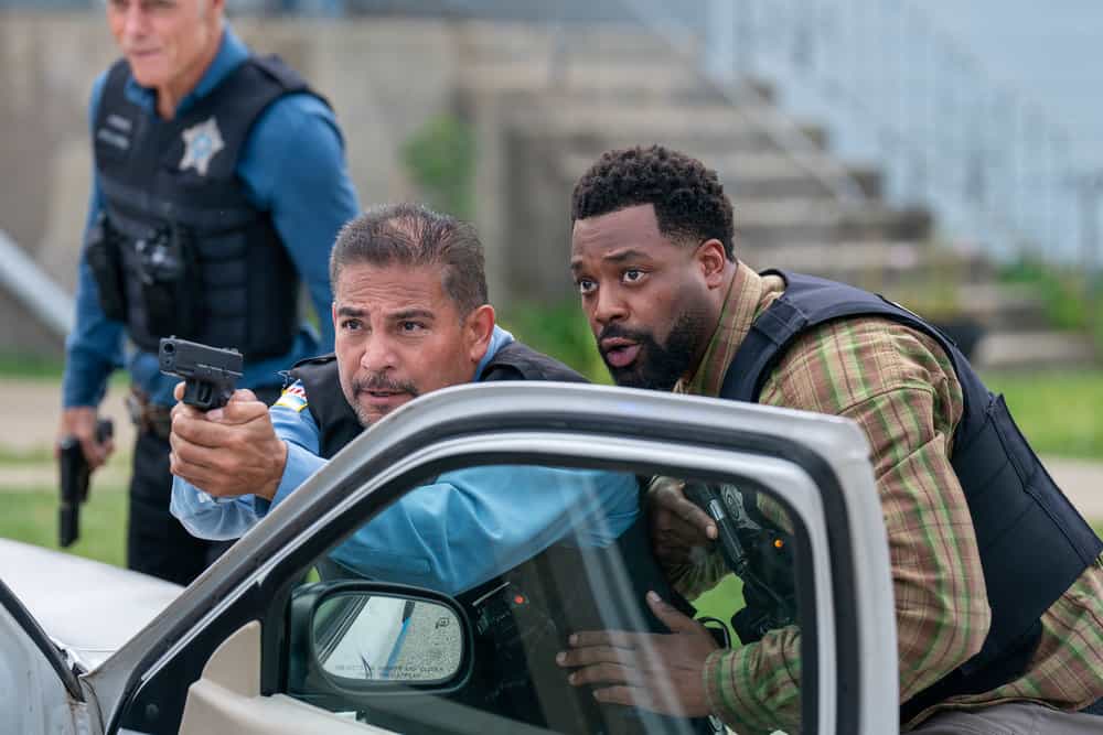 CHICAGO P.D. -- "Send Me" Episode 1306 -- Pictured: (l-r) Eddie Fernandez as Patrol Officer, LaRoyce Hawkins as Officer Kevin Atwater -- (Photo by: Elizabeth Sisson/NBC)
