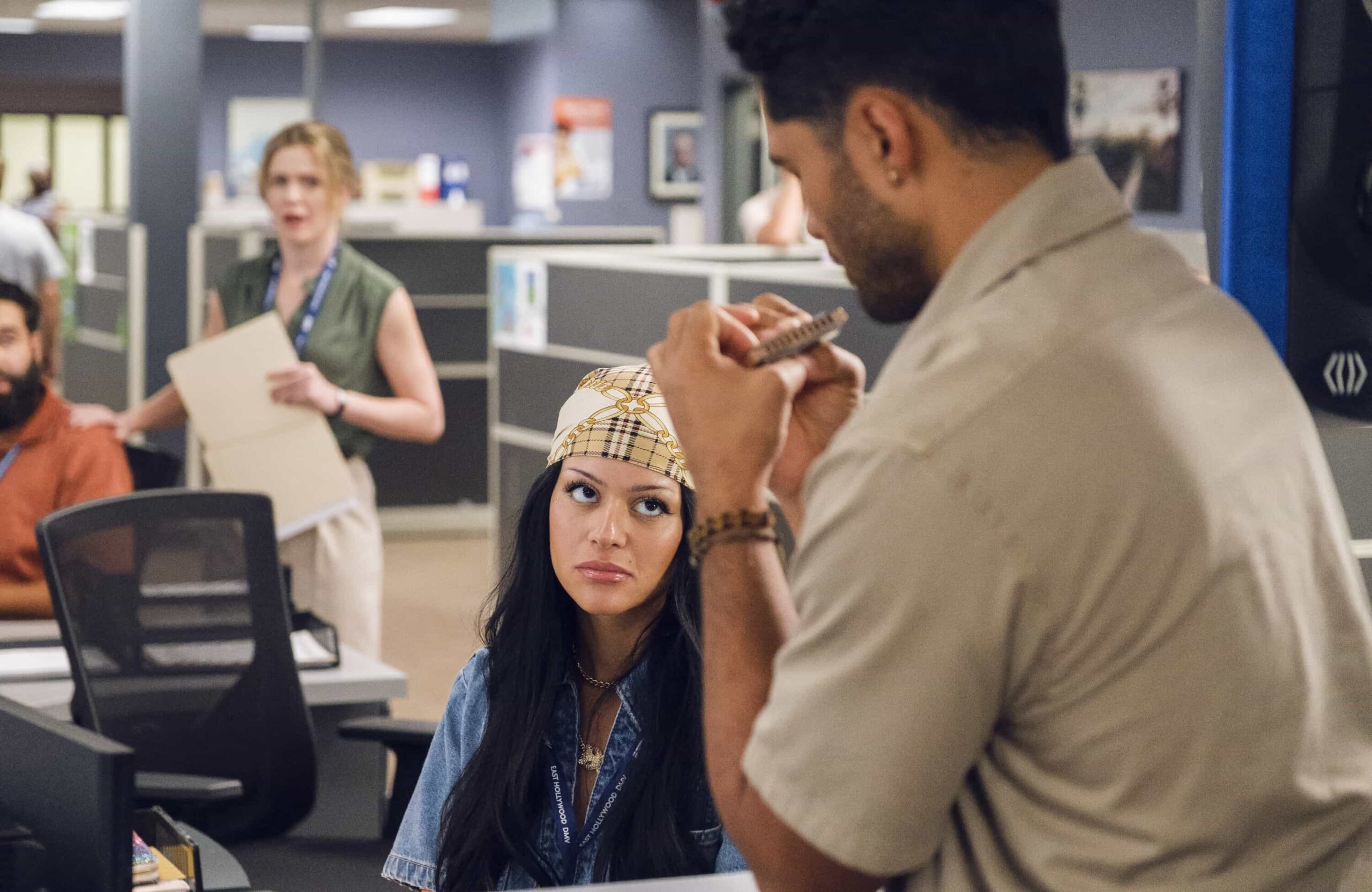 DMV Season 1 Episode 5 “Stick Shift” – When Ceci accuses Colette of only being kind for the credit, Colette anonymously gives Noa the perfect gift, on DMV, Monday, Nov. 10 (8:30-9:00 PM, ET/PT) on the CBS Television Network, and streaming on Paramount+ (live and on-demand for Paramount+ Premium plan subscribers, or on-demand for Paramount+ Essential subscribers the day after the episode airs)*. Pictured L to R:  Harriet Dyer as Colette, Gigi Zumbado as Ceci and Alex Tarrant as Noa. Photo: Bertrand Calmeau/CBS ©2025 CBS Broadcasting, Inc. All Rights Reserved.