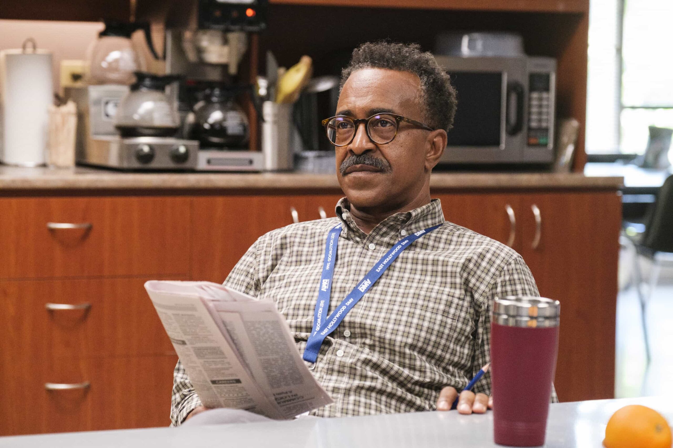 “Stick Shift” – When Ceci accuses Colette of only being kind for the credit, Colette anonymously gives Noa the perfect gift, on DMV, Monday, Nov. 10 (8:30-9:00 PM, ET/PT) on the CBS Television Network, and streaming on Paramount+ (live and on-demand for Paramount+ Premium plan subscribers, or on-demand for Paramount+ Essential subscribers the day after the episode airs)*. Pictured: Tim Meadows as Gregg. Photo: Bertrand Calmeau/CBS ©2025 CBS Broadcasting, Inc. All Rights Reserved.