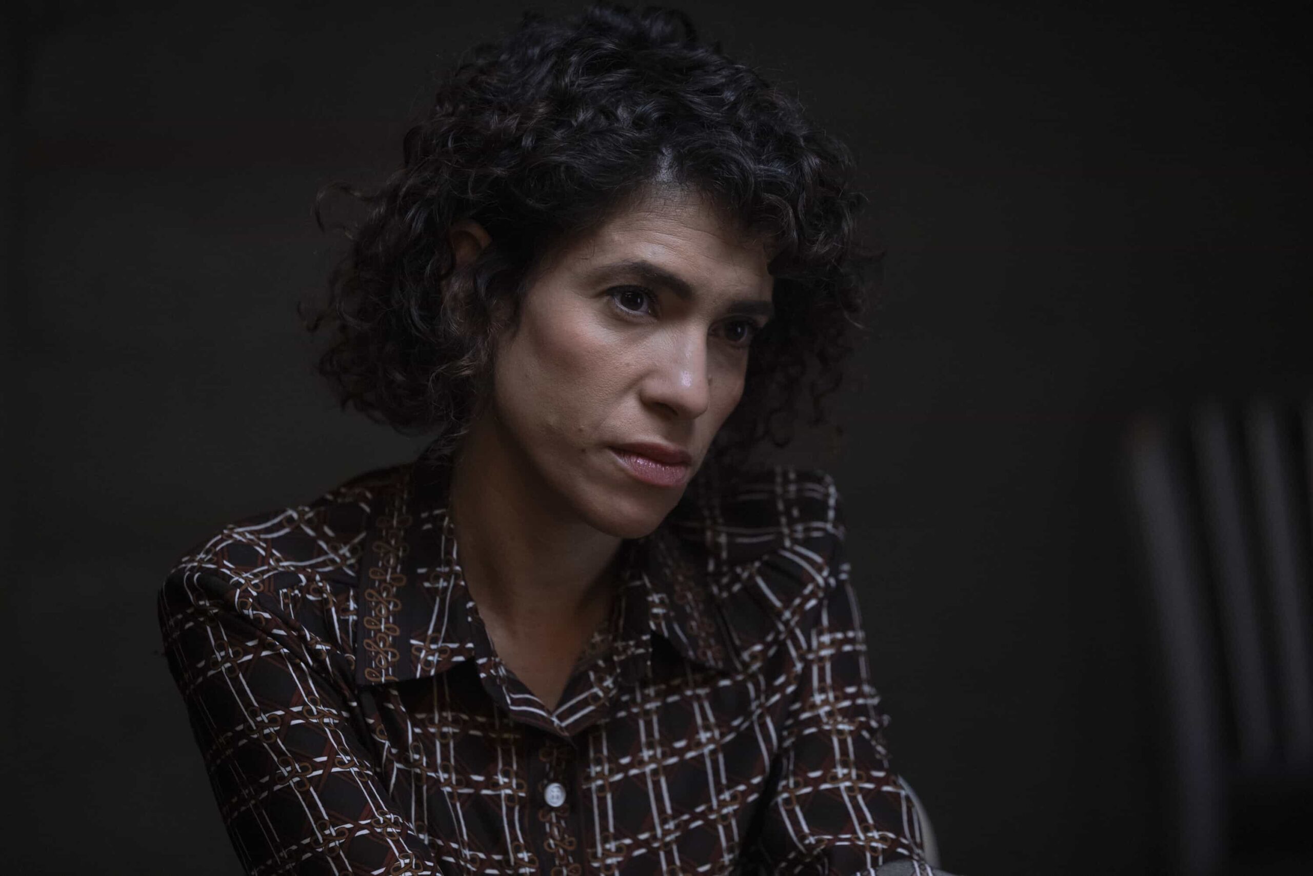 “Funny How Time Slips Away” – When a naval officer mysteriously dies in the ‘90s, Gibbs (Austin Stowell) and the team travel to the small dust-blown town of Serenity, Calif., where they encounter secret-harboring residents, an uncooperative sheriff and an investigation that will reverberate for decades, on the first part of the NCIS crossover event on NCIS: ORIGINS, Tuesday, Nov. 11 (8:00-9:00 PM, ET/PT) on the CBS Television Network, and streaming on Paramount+ (live and on demand for Paramount+ Premium plan subscribers, or on demand for Paramount+ Essential subscribers the day after the episode airs)*. Mark Harmon returns to the role of Gibbs in a special guest appearance.  Pictured (L-R): Diany Rodriguez as Vera Strickland.  Photo: Sonja Flemming/CBS ©2025 CBS Broadcasting, Inc. All Rights Reserved.