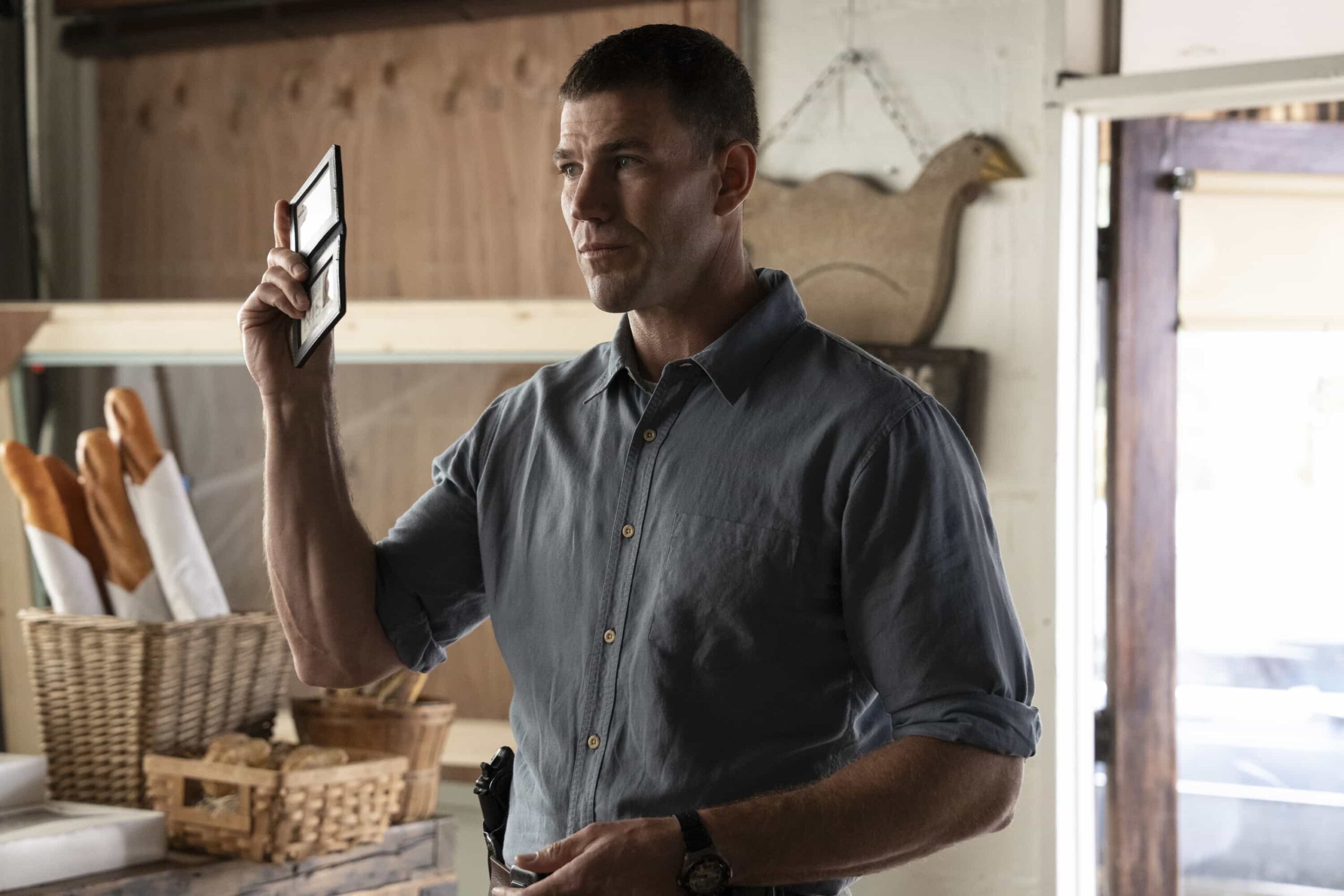 “Funny How Time Slips Away” – When a naval officer mysteriously dies in the ‘90s, Gibbs (Austin Stowell) and the team travel to the small dust-blown town of Serenity, Calif., where they encounter secret-harboring residents, an uncooperative sheriff and an investigation that will reverberate for decades, on the first part of the NCIS crossover event on NCIS: ORIGINS, Tuesday, Nov. 11 (8:00-9:00 PM, ET/PT) on the CBS Television Network, and streaming on Paramount+ (live and on demand for Paramount+ Premium plan subscribers, or on demand for Paramount+ Essential subscribers the day after the episode airs)*. Mark Harmon returns to the role of Gibbs in a special guest appearance.  Pictured (L-R): Austin Stowell as Leroy Jethro Gibbs.  Photo: Sonja Flemming/CBS ©2025 CBS Broadcasting, Inc. All Rights Reserved.