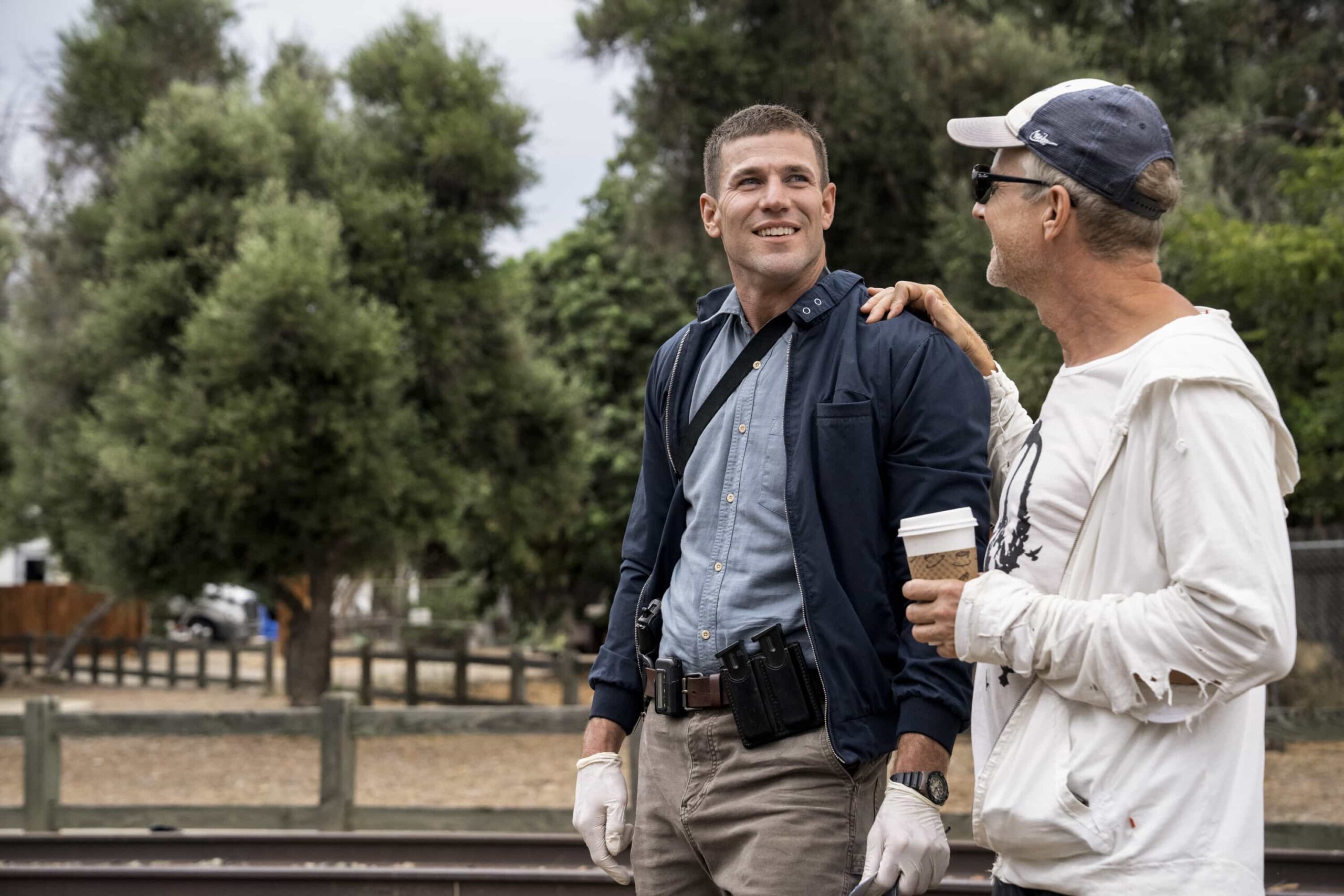 NCIS Origins Season 2 Episode 5 “Funny How Time Slips Away” – When a naval officer mysteriously dies in the ‘90s, Gibbs (Austin Stowell) and the team travel to the small dust-blown town of Serenity, Calif., where they encounter secret-harboring residents, an uncooperative sheriff and an investigation that will reverberate for decades, on the first part of the NCIS crossover event on NCIS: ORIGINS, Tuesday, Nov. 11 (8:00-9:00 PM, ET/PT) on the CBS Television Network, and streaming on Paramount+ (live and on demand for Paramount+ Premium plan subscribers, or on demand for Paramount+ Essential subscribers the day after the episode airs)*. Mark Harmon returns to the role of Gibbs in a special guest appearance.  Pictured (L-R): Austin Stowell as Leroy Jethro Gibbs.  Photo: Greg Gayne/CBS ©2025 CBS Broadcasting, Inc. All Rights Reserved.