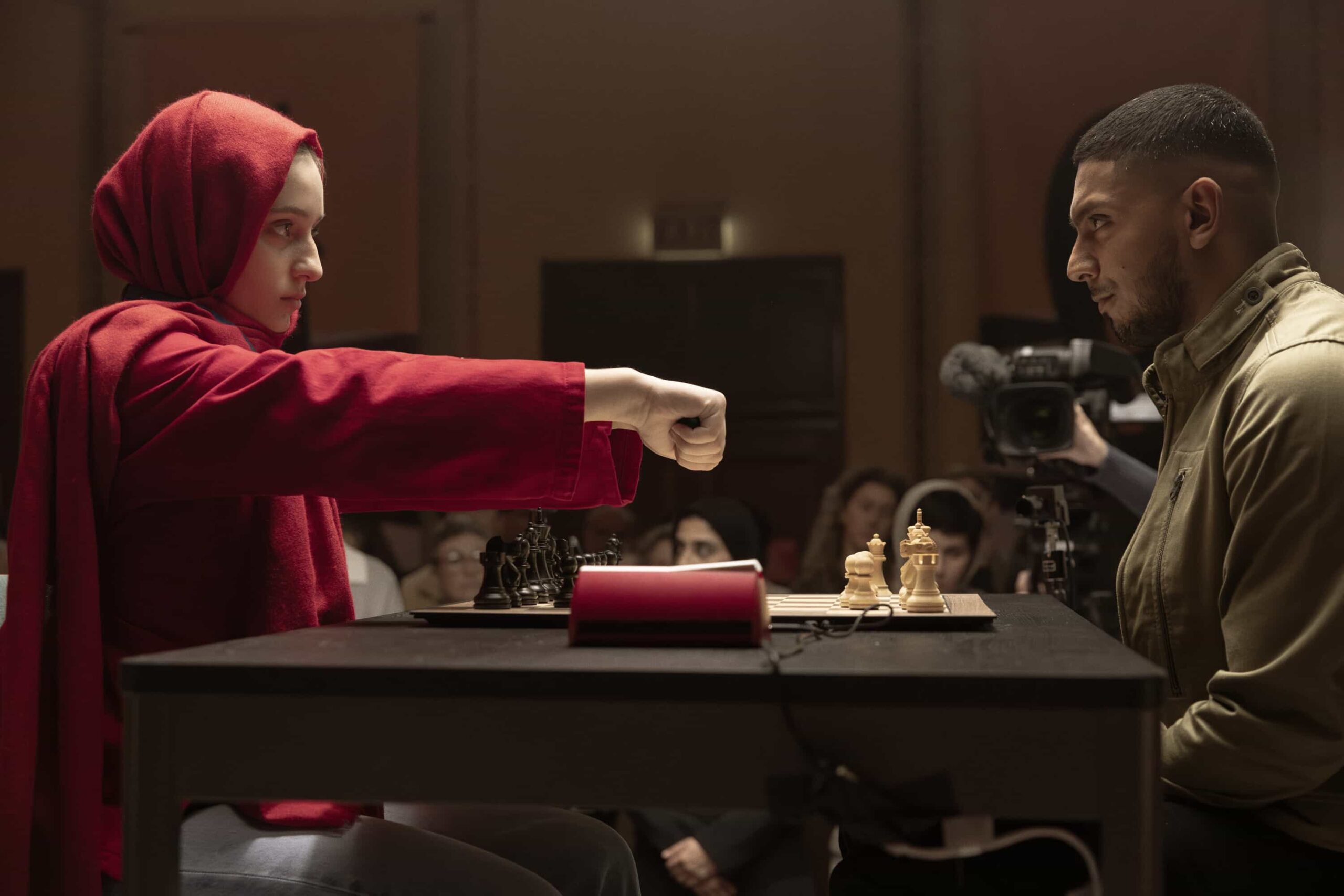 “Black Is White” – When a U.S. Navy attaché is found dead with a USB lodged in his throat, the team tracks a killer believed to have ties to an international chess tournament in Sydney, on NCIS: SYDNEY, Tuesday, Nov. 11 (10:00-11:00 PM, ET/PT) on the CBS Television Network, and streaming on Paramount+ (live and on demand for Paramount+ Premium plan subscribers, or on demand for Paramount+ Essential subscribers the day after the episode airs)*. L-R: Lily Montalto as Rana Azad and Sean Sagar as NCIS Special Agent DeShawn Jackson in NCIS: Sydney episode 5, season 3 streaming on Paramount+, 2025. Photo Credit:  Daniel Asher Smith/Paramount+   © TM & © 2025 CBS Studios Inc. NCIS: Sydney and related marks and logos  are trademarks of CBS Studios Inc. All Rights Reserved.