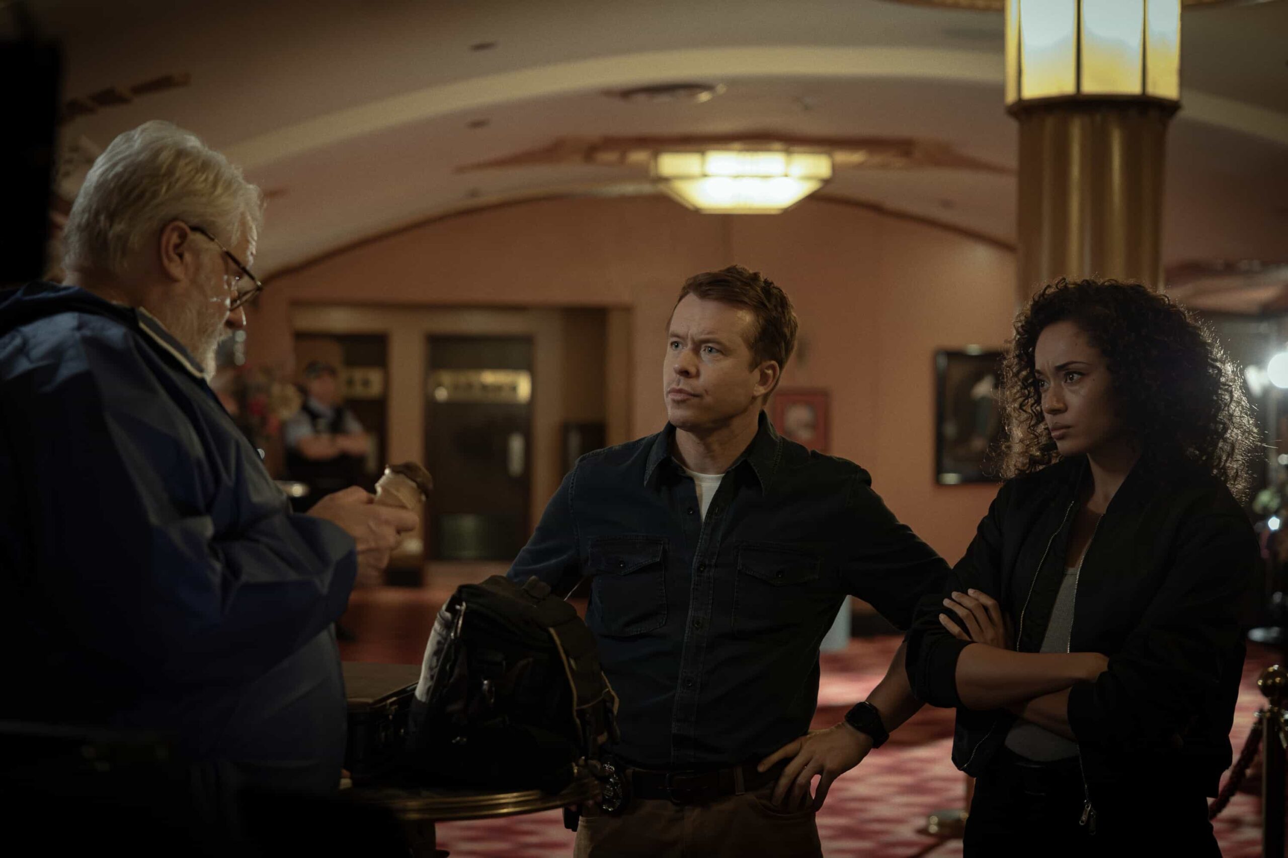 “Black Is White” – When a U.S. Navy attaché is found dead with a USB lodged in his throat, the team tracks a killer believed to have ties to an international chess tournament in Sydney, on NCIS: SYDNEY, Tuesday, Nov. 11 (10:00-11:00 PM, ET/PT) on the CBS Television Network, and streaming on Paramount+ (live and on demand for Paramount+ Premium plan subscribers, or on demand for Paramount+ Essential subscribers the day after the episode airs)*. L-R: William McInnes as Forensic Pathologist Dr. Roy Penrose, Todd Lasance as AFP Liaison Officer Sergeant Jim \'JD\' Dempsey and Olivia Swann as NCIS Special Agent Captain Michelle Mackey in NCIS: Sydney episode 5, season 3 streaming on Paramount+, 2025. Photo Credit:  Daniel Asher Smith/Paramount+   © TM & © 2025 CBS Studios Inc. NCIS: Sydney and related marks and logos  are trademarks of CBS Studios Inc. All Rights Reserved.