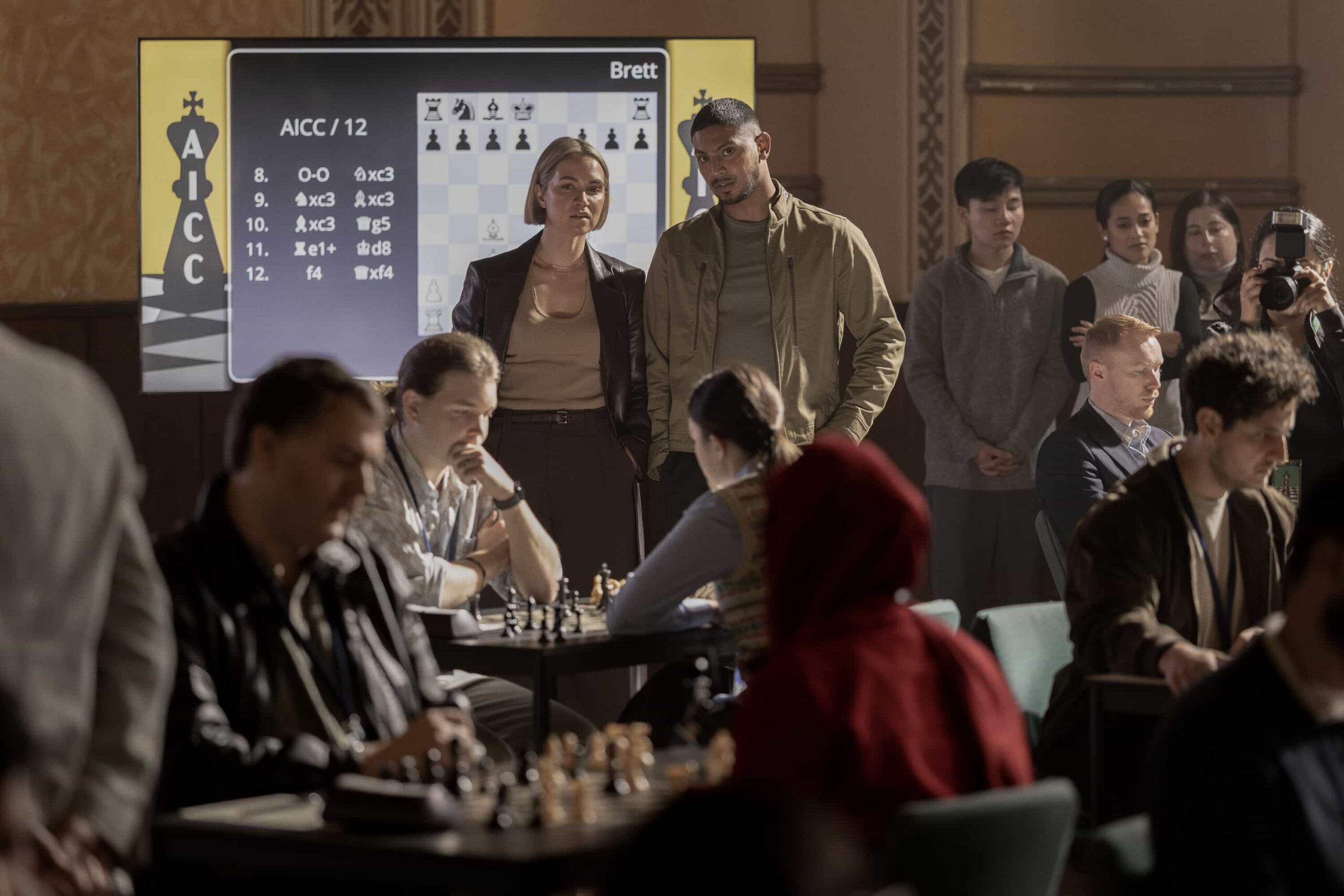 “Black Is White” – When a U.S. Navy attaché is found dead with a USB lodged in his throat, the team tracks a killer believed to have ties to an international chess tournament in Sydney, on NCIS: SYDNEY, Tuesday, Nov. 11 (10:00-11:00 PM, ET/PT) on the CBS Television Network, and streaming on Paramount+ (live and on demand for Paramount+ Premium plan subscribers, or on demand for Paramount+ Essential subscribers the day after the episode airs)*. Tuuli Narkle as AFP Liaison Officer Constable Evie Cooper and Sean Sagar as NCIS Special Agent DeShawn Jackson in NCIS: Sydney episode 5, season 3 streaming on Paramount+, 2025. Photo Credit:  Daniel Asher Smith/Paramount+   © TM & © 2025 CBS Studios Inc. NCIS: Sydney and related marks and logos  are trademarks of CBS Studios Inc. All Rights Reserved.