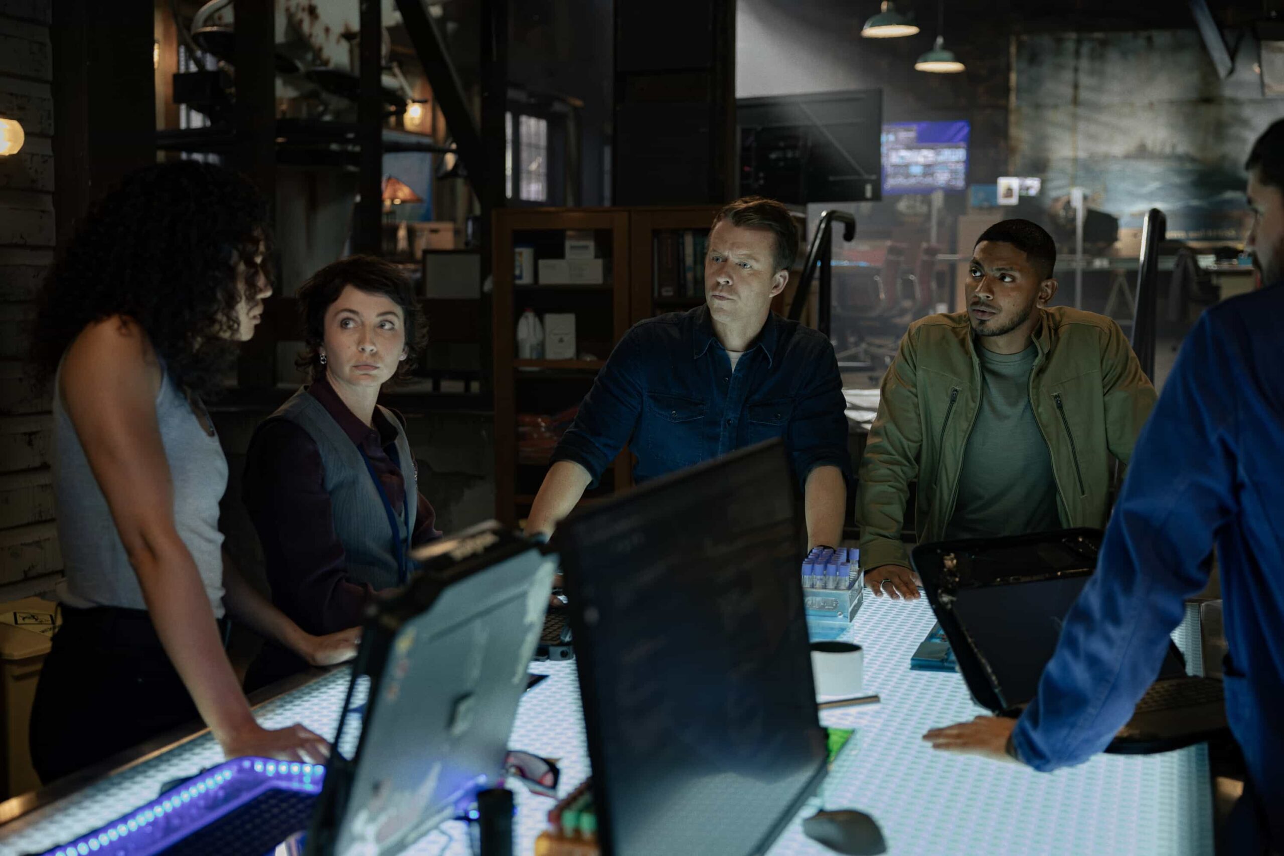 “Black Is White” – When a U.S. Navy attaché is found dead with a USB lodged in his throat, the team tracks a killer believed to have ties to an international chess tournament in Sydney, on NCIS: SYDNEY, Tuesday, Nov. 11 (10:00-11:00 PM, ET/PT) on the CBS Television Network, and streaming on Paramount+ (live and on demand for Paramount+ Premium plan subscribers, or on demand for Paramount+ Essential subscribers the day after the episode airs)*. L-R: Olivia Swann as NCIS Special Agent Captain Michelle Mackey, Mavournee Hazel as Forensic Pathologist Bluebird \'Blue\' Gleeson, Todd Lasance as AFP Liaison Officer Sergeant Jim \'JD\' Dempsey and Sean Sagar as NCIS Special Agent DeShawn Jackson in NCIS: Sydney episode 5, season 3 streaming on Paramount+, 2025. Photo Credit:  Daniel Asher Smith/Paramount+   © TM & © 2025 CBS Studios Inc. NCIS: Sydney and related marks and logos  are trademarks of CBS Studios Inc. All Rights Reserved.