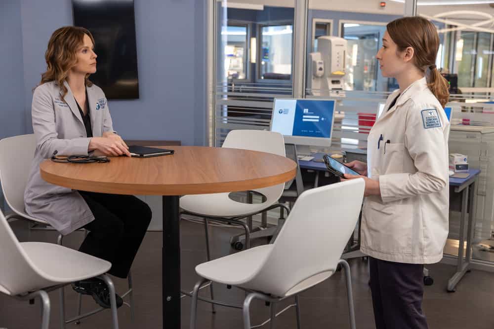 CHICAGO MED -- "Double Down" Episode 1107 -- Pictured: (l-r) Abrial Bonilla as Med Student Lina Martinez, Sarah Ramos as Dr. Caitlin Lenox -- (Photo by: George Burns Jr/NBC)