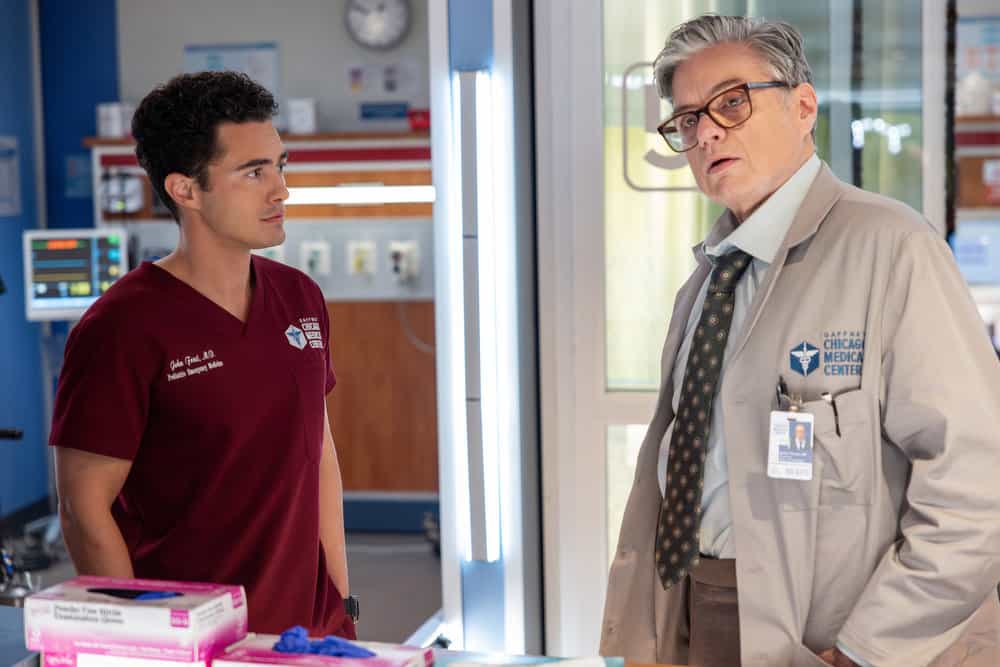 CHICAGO MED Season 11 Episode 7 -- "Double Down" Episode 1107 -- Pictured: (l-r) Darren Barnet as Dr. John Frost, Oliver Platt as Dr. Daniel Charles -- (Photo by: George Burns Jr/NBC)