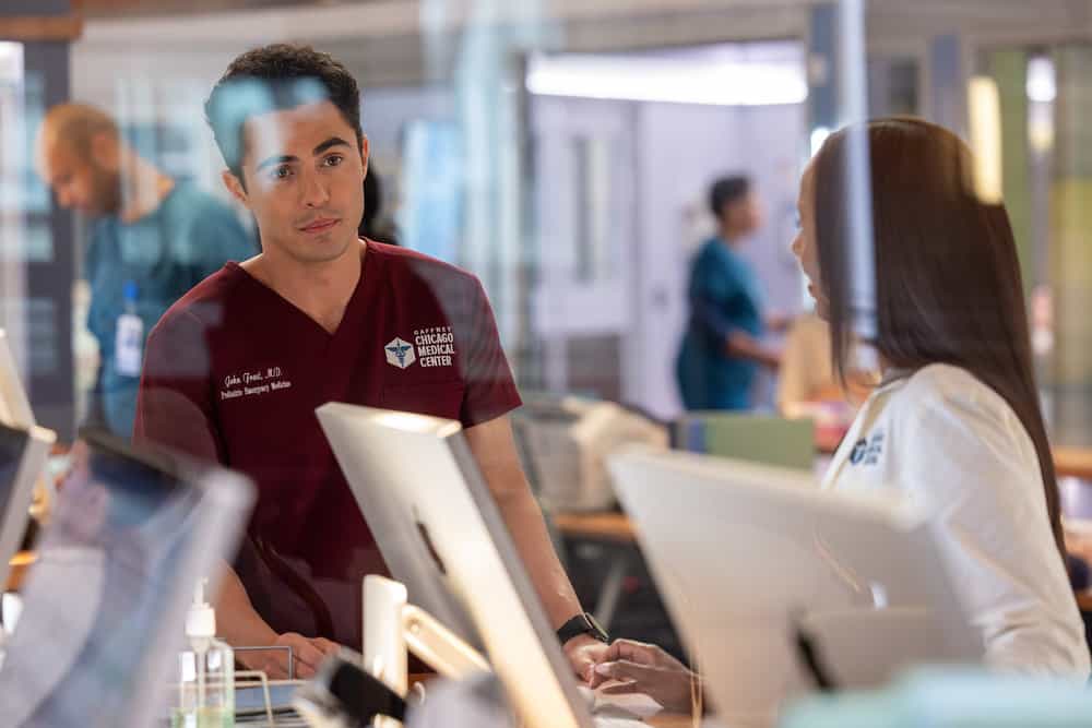 CHICAGO MED -- "Double Down" Episode 1107 -- Pictured: (l-r) Darren Barnet as Dr. John Frost, Ashlei Sharpe Chestnut as Dr. Naomi Howard -- (Photo by: George Burns Jr/NBC)