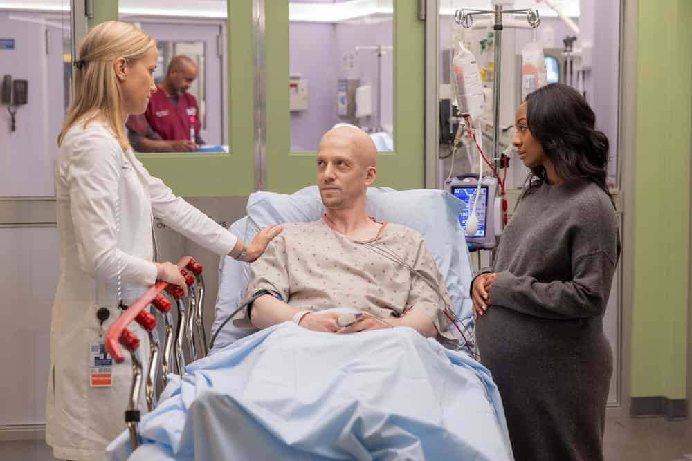 CHICAGO MED -- "Double Down" Episode 1107 -- Pictured: (l-r) Jessy Schram as Dr. Hannah Asher, Zach Appelman as Jeremy Lockhart, Tetona Jackson as Esme Lockhart -- (Photo by: George Burns Jr/NBC)