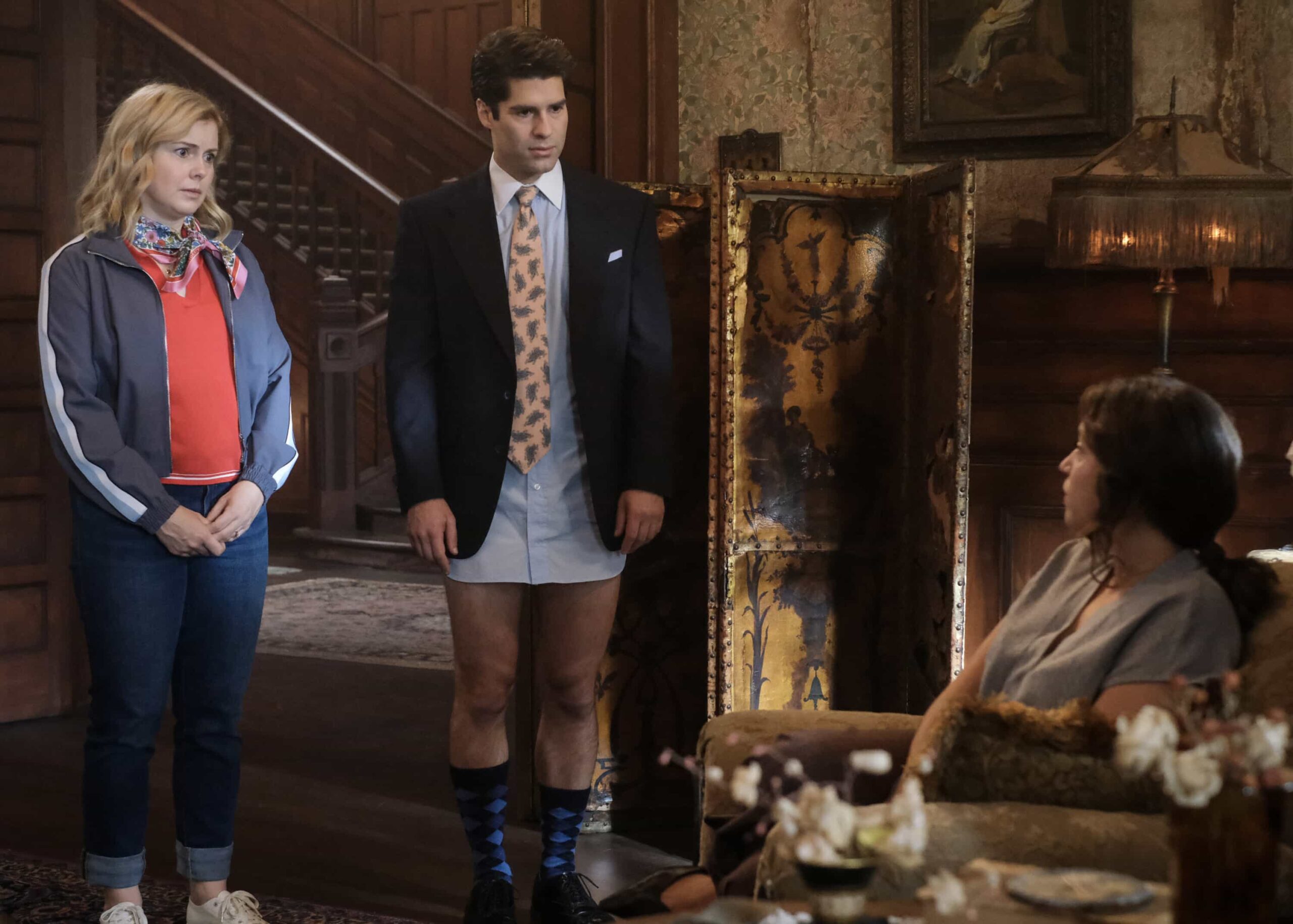 Ghosts Season 5 Episode 5 “T-Daddy” – Trevor’s relationship with his daughter is strained when he pushes her to follow a career in finance over poetry. Meanwhile, Jay confronts labor unrest at the restaurant, on GHOSTS, Thursday, Nov. 13 (8:30-9:00 PM, ET/PT) on the CBS Television Network, and streaming on Paramount+ (live and on-demand for Paramount+ Premium plan subscribers, or on-demand for Paramount+ Essential subscribers the day after the episode airs)*.  Pictured (L-R): Rose McIver as Samantha and Asher Grodman as Trevor.  Photo: Bertrand Calmeau/CBS ©2025 CBS Broadcasting, Inc. All Rights Reserved.